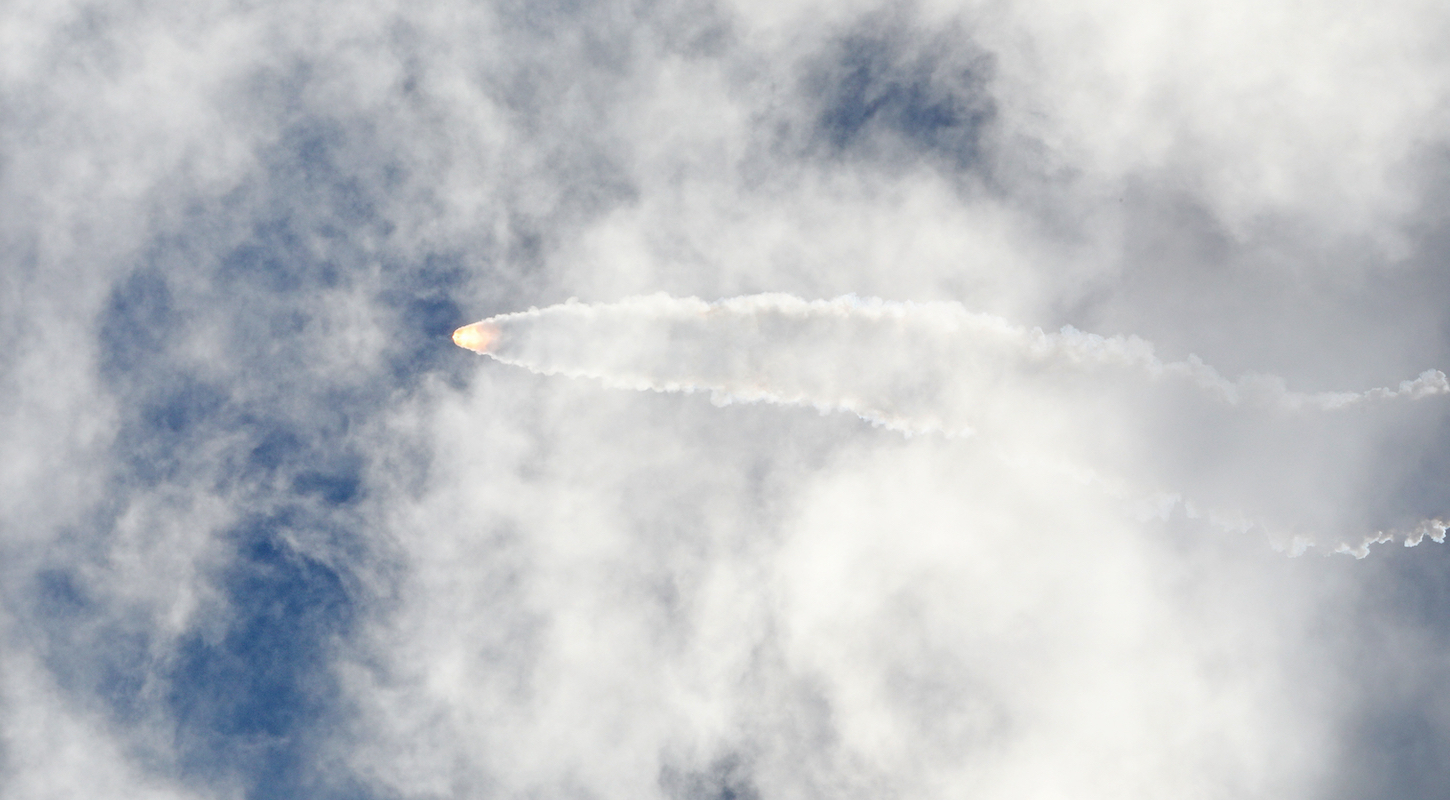 The United Launch Alliance (ULA) Atlas V rocket with Boeing's CST-100 Starliner spacecraft appears as a blazing meteor with a long trail of vapor as it launches from Cape Canaveral Space Force Station in Florida on June 5, 2024.