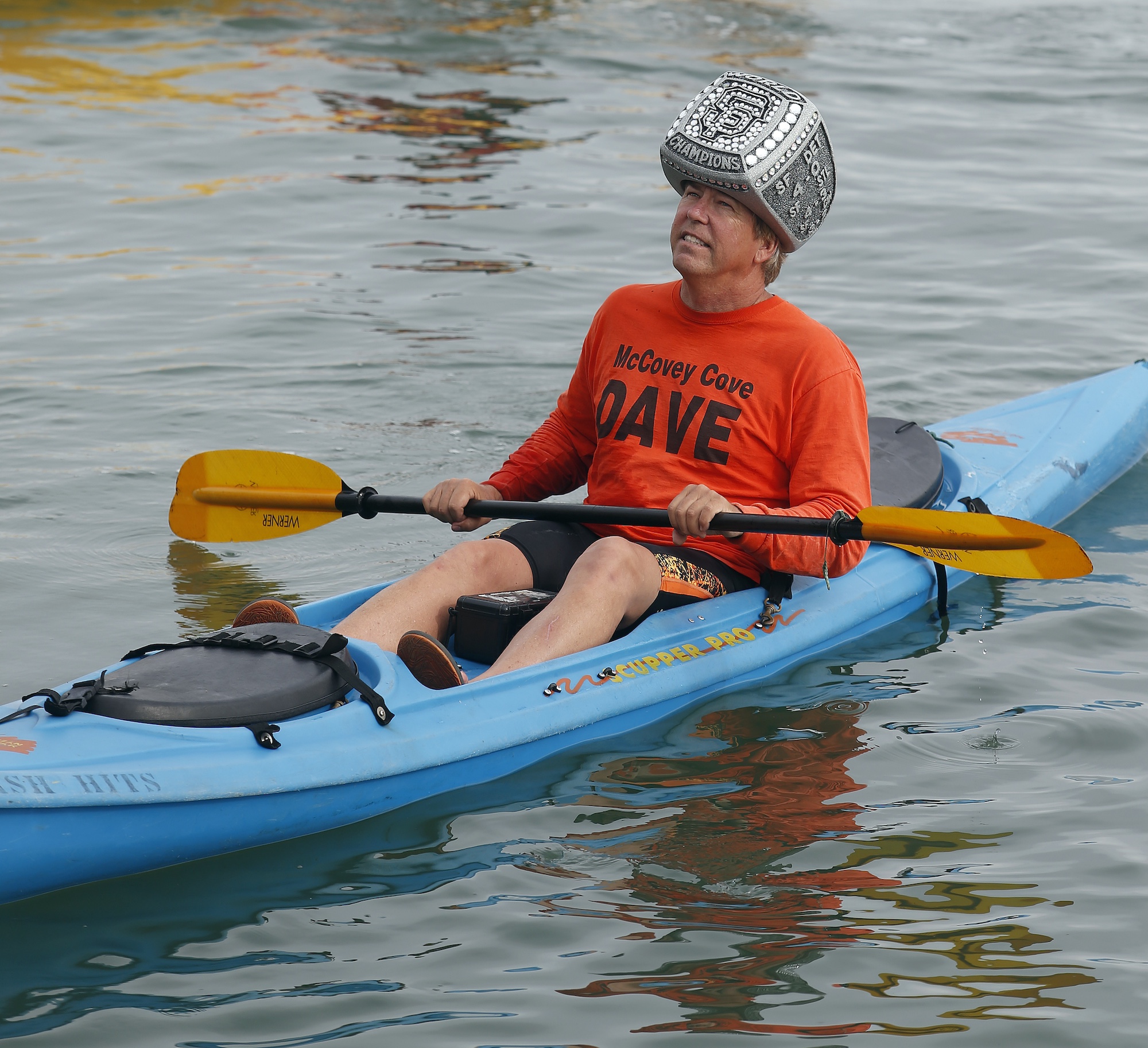 San Francisco Giants fan "McCovey Dave" Edlund, of Los Altos, wears a World Series ring on his head in McCovey Cove before Game 4 of the National League baseball championship series against the St. Louis Cardinals at AT&amp;T Park in San Francisco, Calif., on Wednesday, Oct. 15, 2014. (Jane Tyska/Bay Area News Group)