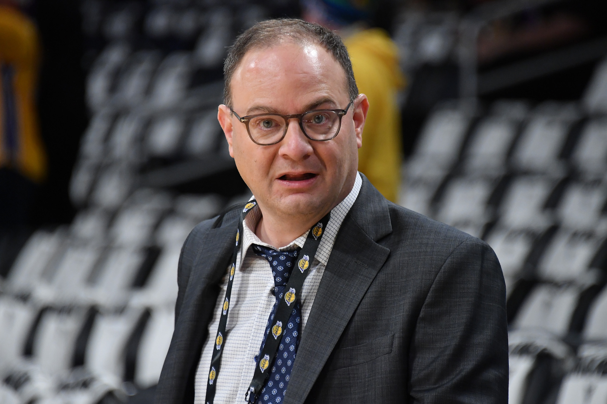 ESPN's Adrian Wojnarowski looks on at a Lakers game