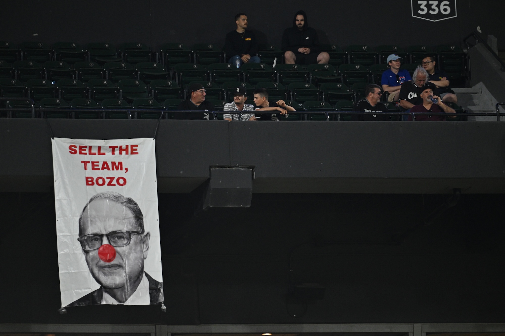 CHICAGO, IL - MAY 23: A sign depicting Chicago White Sox owner Jerry Reinsdorf hangs from the upper deck during the ninth inning of a game between the Baltimore Orioles and Chicago White Sox at Guaranteed Rate Field on May 23, 2024 in Chicago, Illinois. Baltimore defeated Chicago 8-6. (Photo by Jamie Sabau/Getty Images)