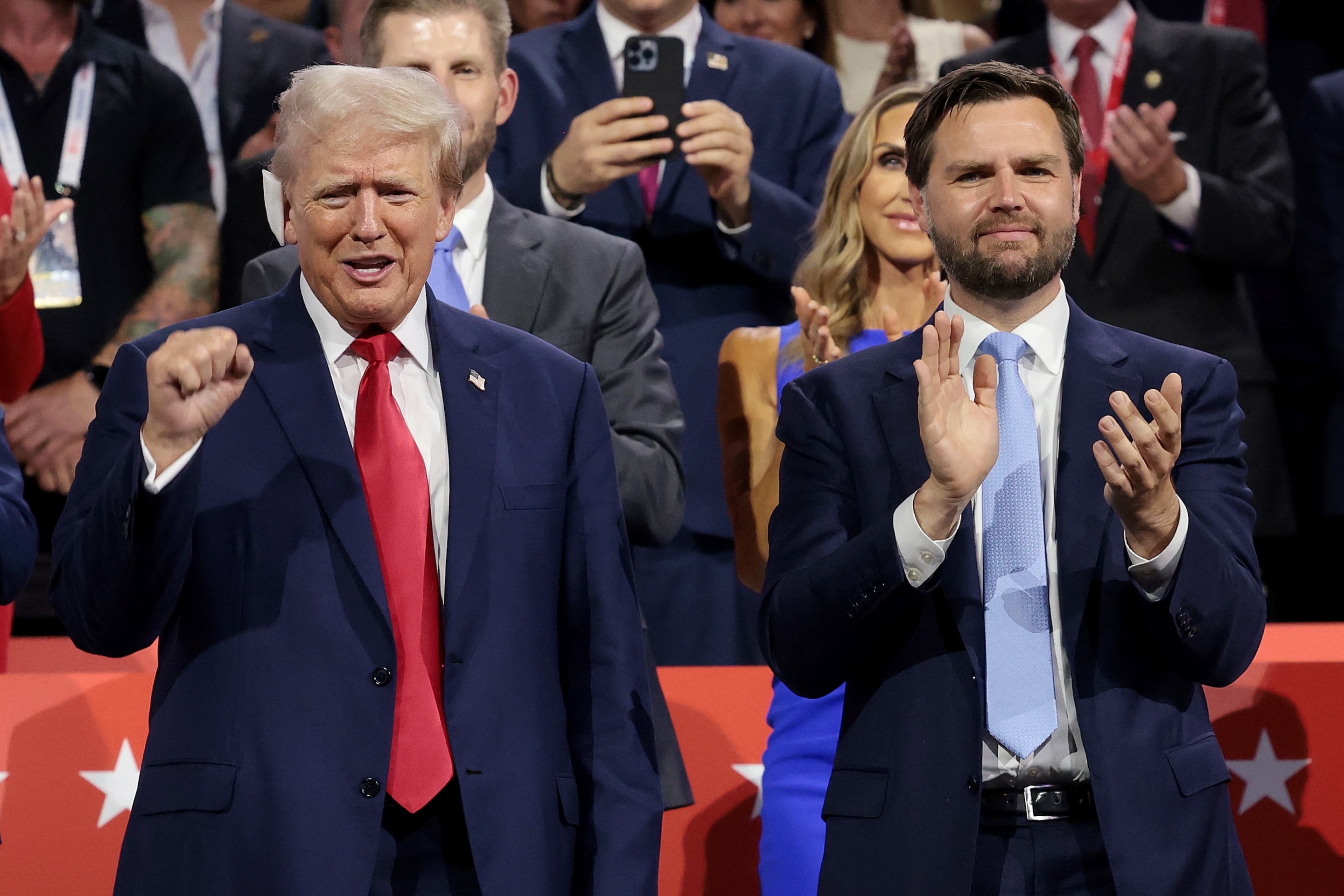 Republican presidential candidate, former U.S. President Donald Trump (L) and Republican vice presidential candidate, U.S. Sen. J.D. Vance (R-OH) appear on the first day of the Republican National Convention at the Fiserv Forum on July 15, 2024 in Milwaukee, Wisconsin. Delegates, politicians, and the Republican faithful are in Milwaukee for the annual convention, concluding with former President Donald Trump accepting his party's presidential nomination