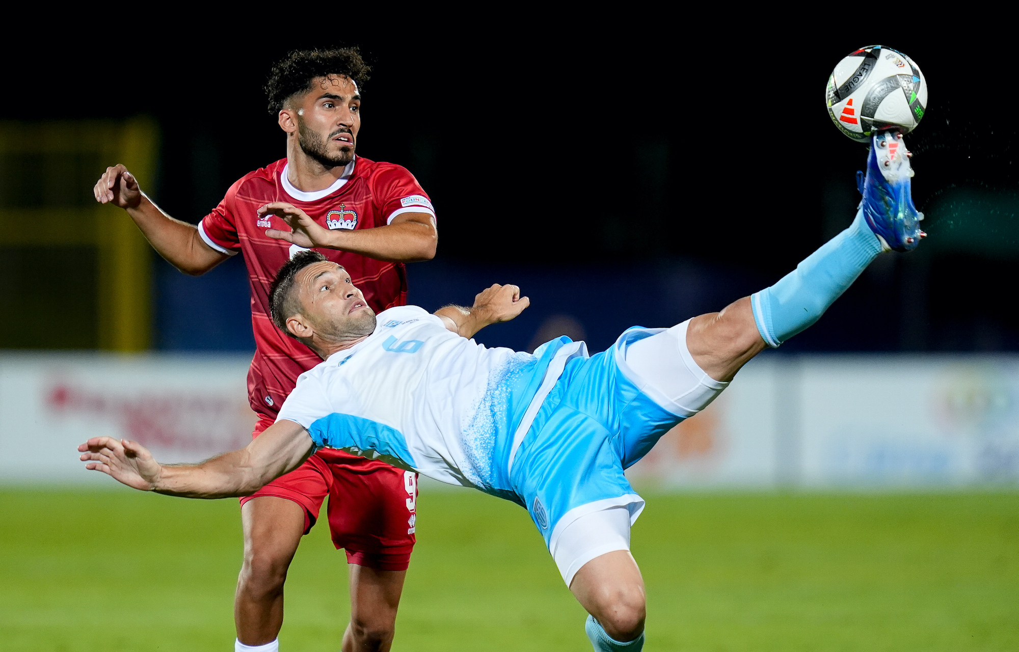 Dante Rossi of San Marino and Ferhat Saglam of Liechtenstein compete for the ball during the UEFA Nations League 2024/2025 League D match