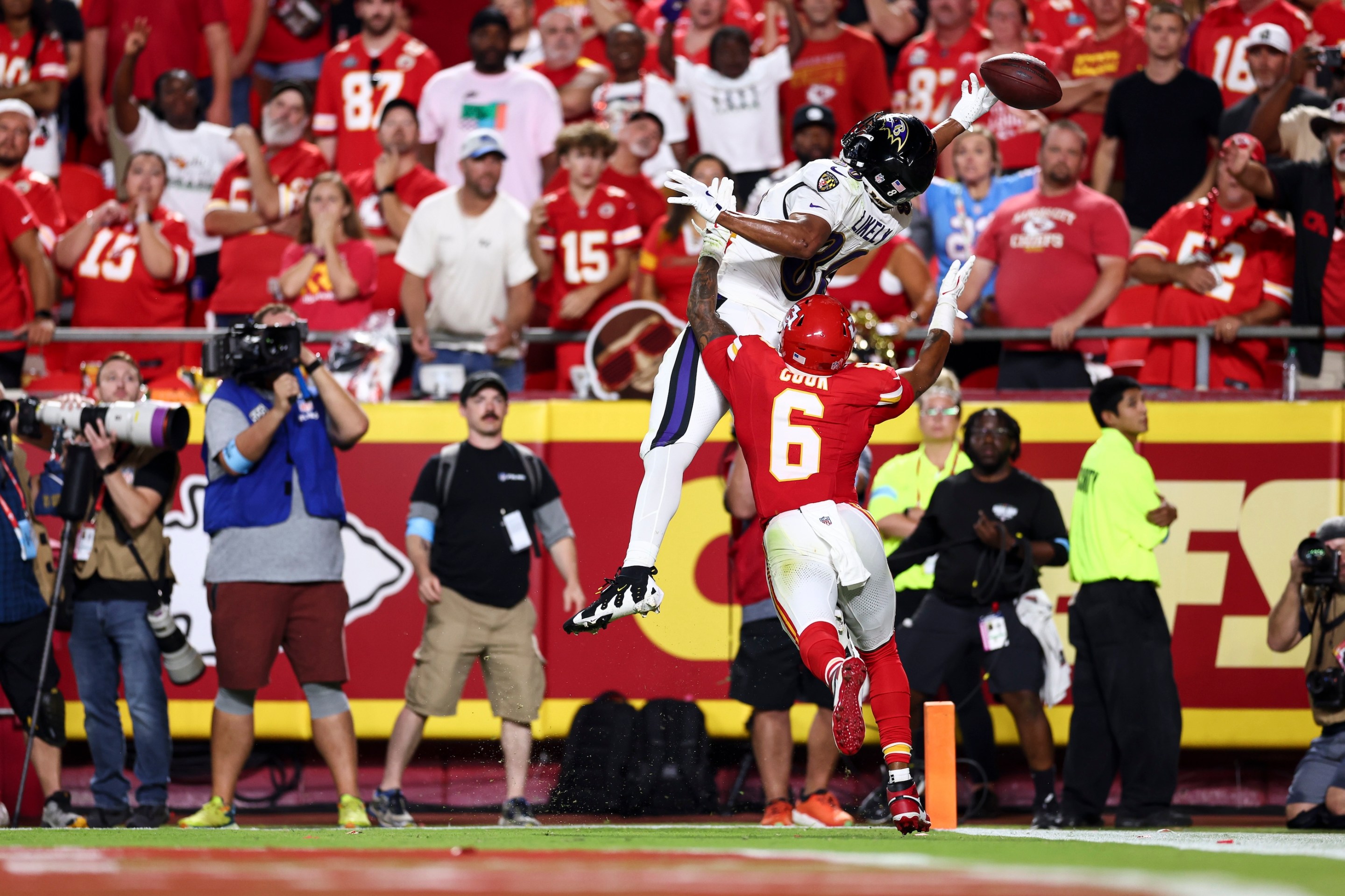 Isaiah Likely of the Baltimore Ravens stretches for a pass he can't quite catch near the end of the fourth quarter of the 2024 NFL season opener in Kansas City.