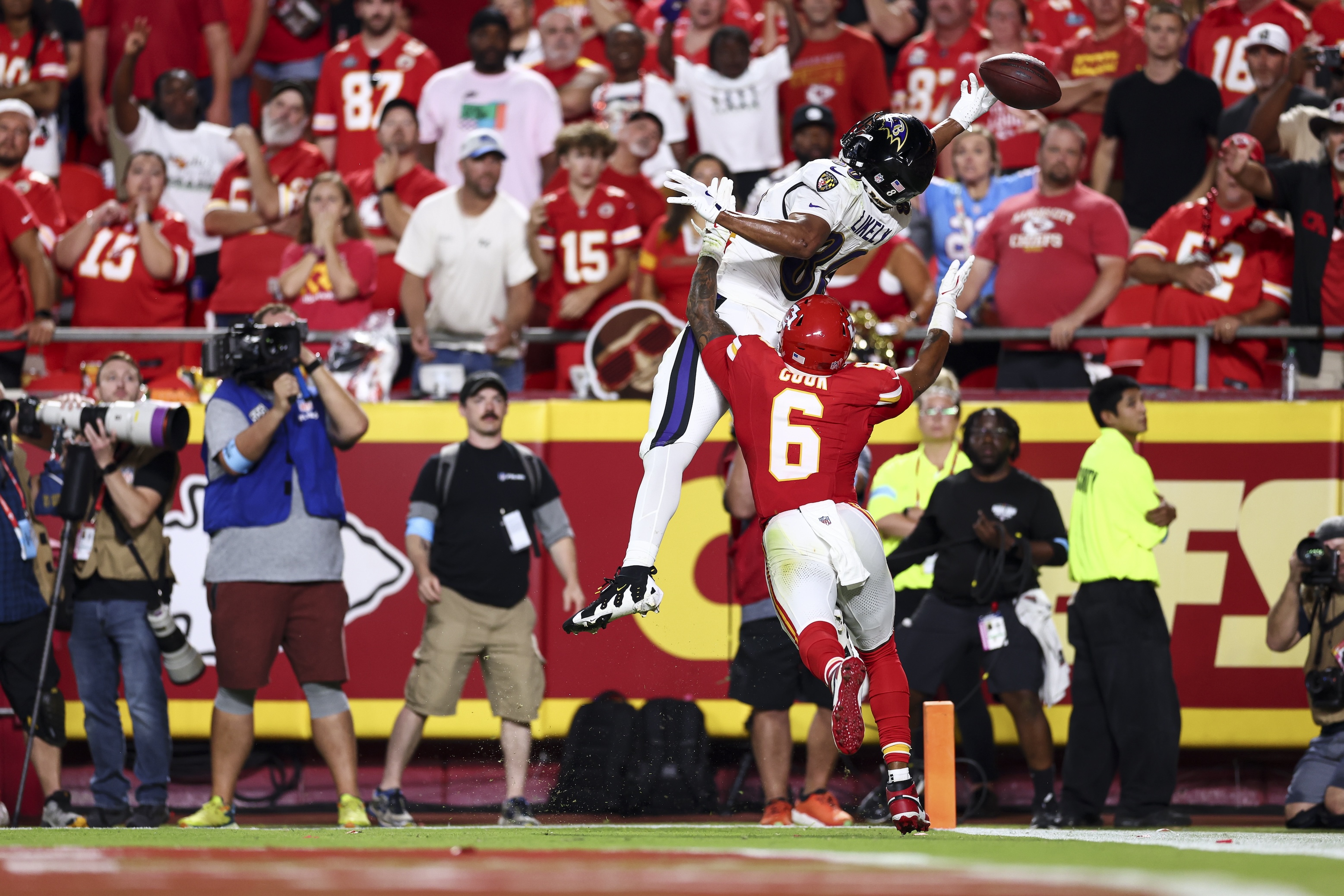 Isaiah Likely of the Baltimore Ravens stretches for a pass he can't quite catch near the end of the fourth quarter of the 2024 NFL season opener in Kansas City.