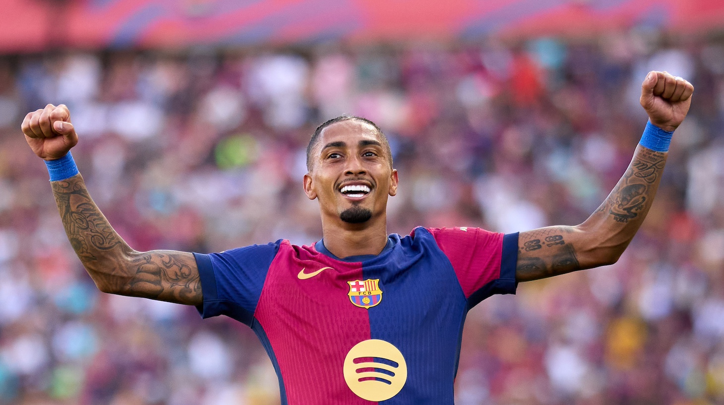 Raphinha of FC Barcelona celebrates after scoring his team's fifth goal during the LaLiga EA Sports match between FC Barcelona and Real Valladolid CF at Estadi Olimpic Lluis Companys on August 31, 2024 in Barcelona, Spain.