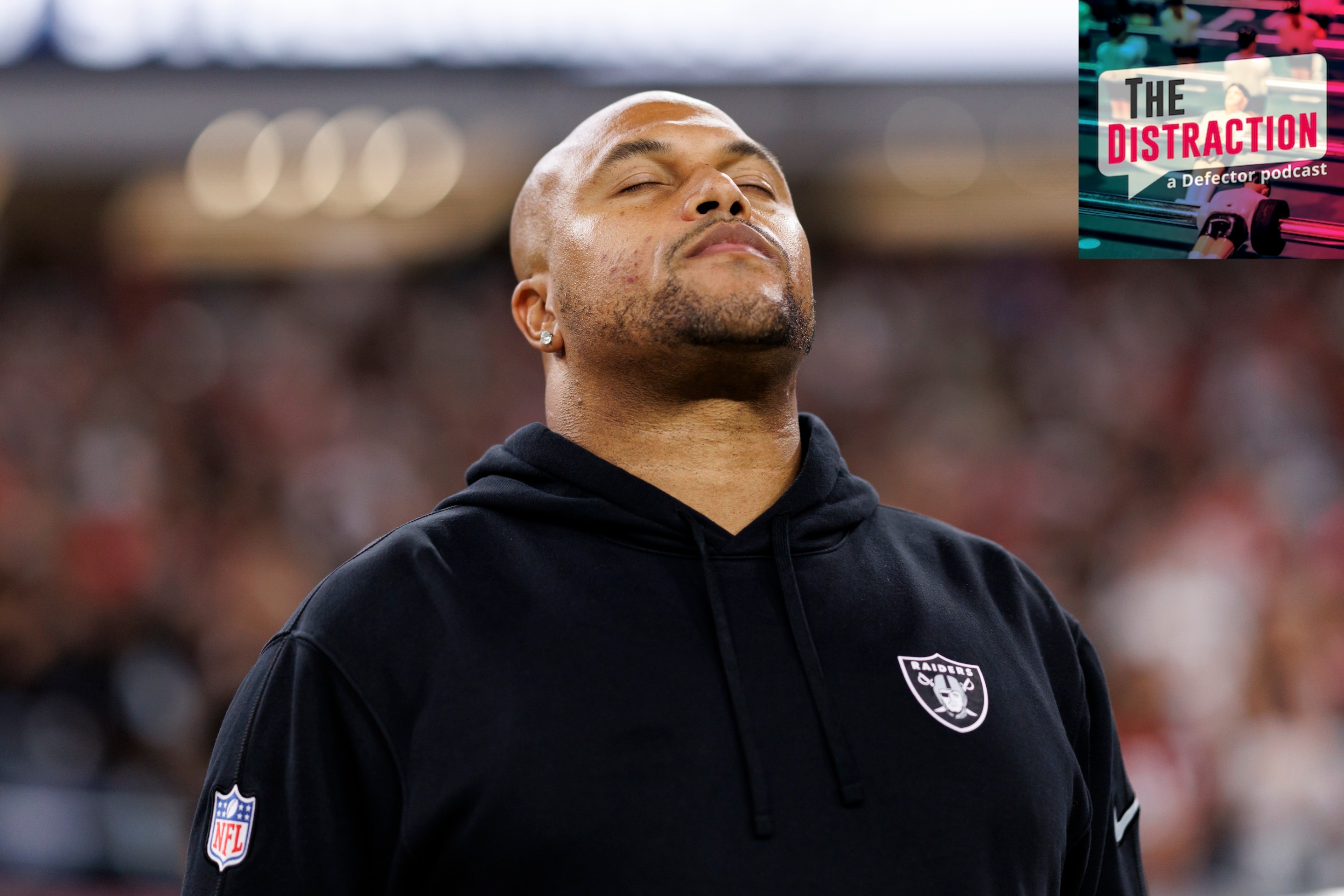 Head coach Antonio Pierce of the Las Vegas Raiders stands on the sidelines during the national anthem prior to an NFL preseason football game against the San Francisco 49ers, at Allegiant Stadium on August 23, 2024.