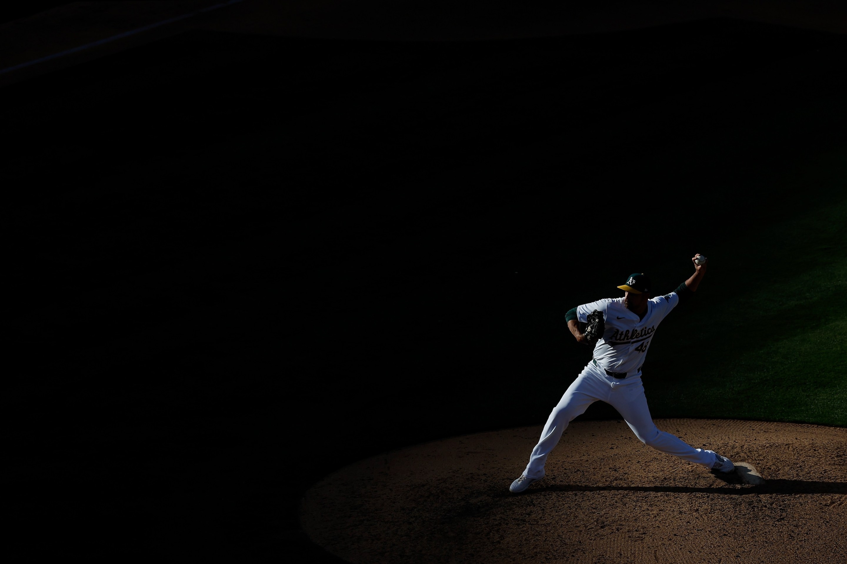 T.J. McFarland #48 of the Oakland Athletics pitches in the top of the sixth inning against the Seattle Mariners at Oakland Coliseum.