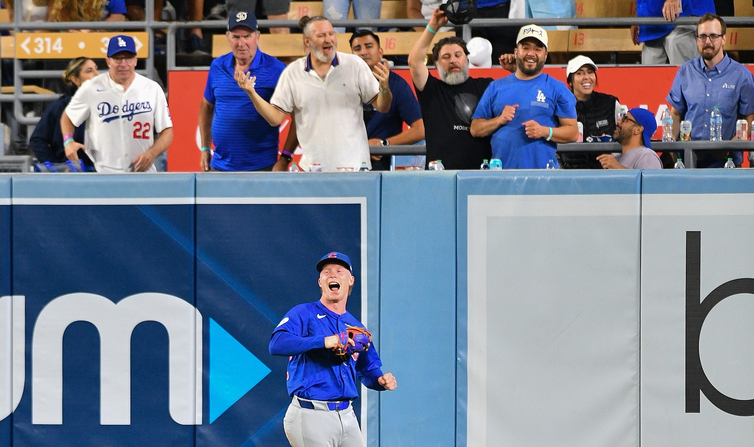 LOS ANGELES, CA - SEPTEMBER 10: Chicago Cubs center fielder Pete Crow-Armstrong (52) celebrates after robbing a home run to end the MLB game between the Chicago Cubs and the Los Angeles Dodgers on September 10, 2024 at Dodger Stadium in Los Angeles, CA. (Photo by Brian Rothmuller/Icon Sportswire)