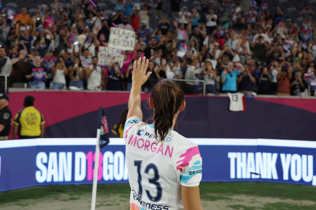 Alex Morgan #13 of San Diego Wave FC waves to the crowd after the game against the North Carolina Courage at Snapdragon Stadium on September 08, 2024 in San Diego, California. This was Morgan’s final NWSL game before her announced retirement.