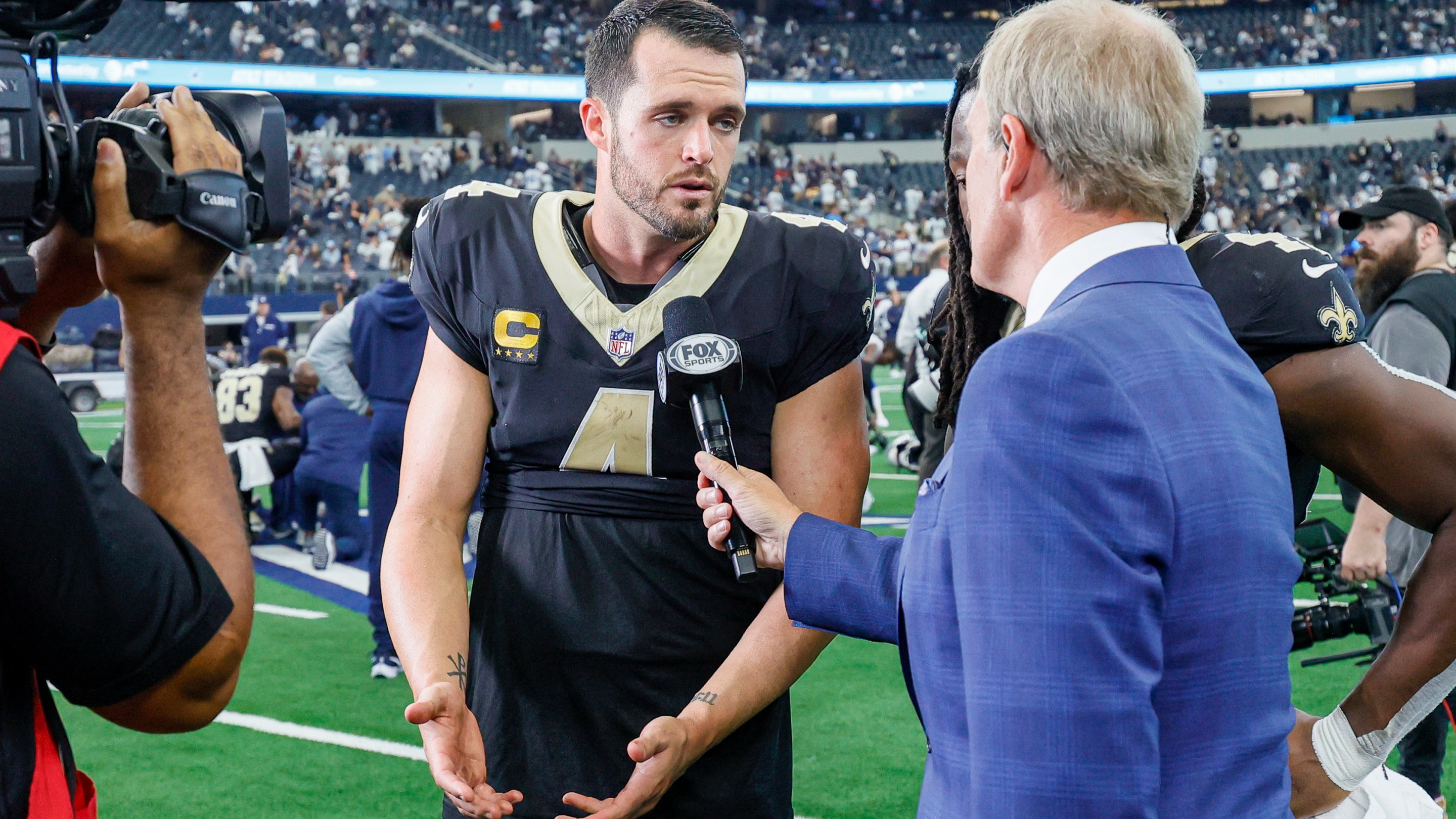 New Orleans Saints quarterback Derek Carr (4) does an interview with FOX Sports Tom Rinaldi after the game between the Dallas Cowboys and the New Orleans Saints.