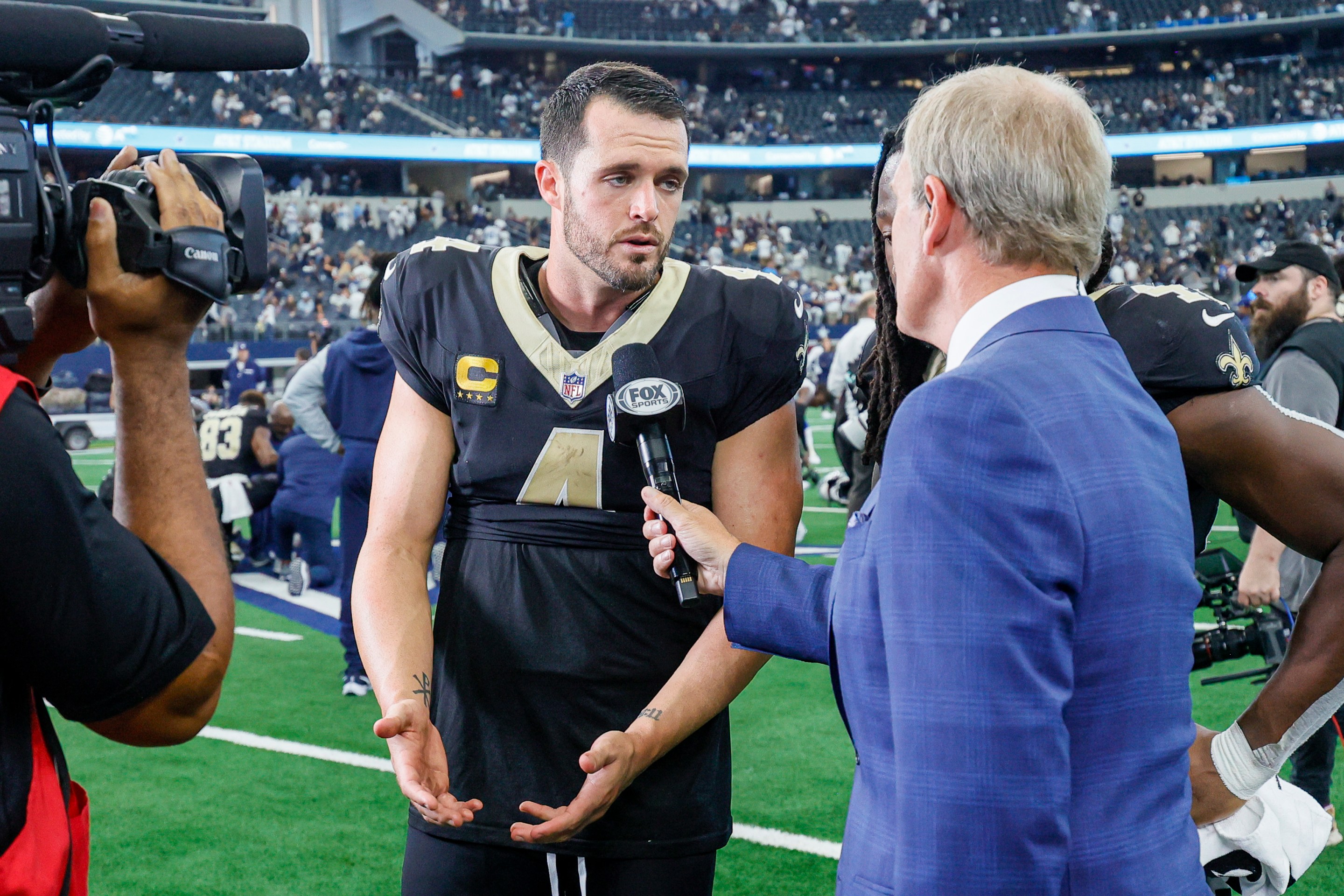 New Orleans Saints quarterback Derek Carr (4) does an interview with FOX Sports Tom Rinaldi after the game between the Dallas Cowboys and the New Orleans Saints.