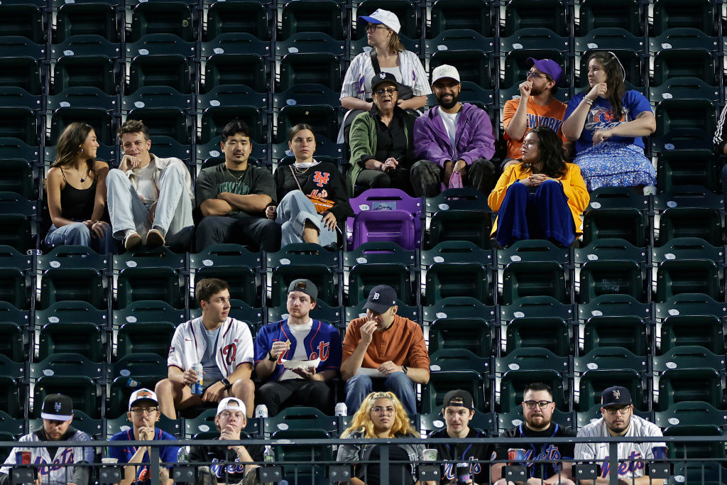 Fans sitting at the Mets ballpark