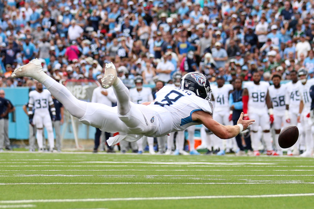 Will Levis #8 of the Tennessee Titans fumbles the ball during the first half against the New York Jets at Nissan Stadium on September 15, 2024 in Nashville, Tennessee.