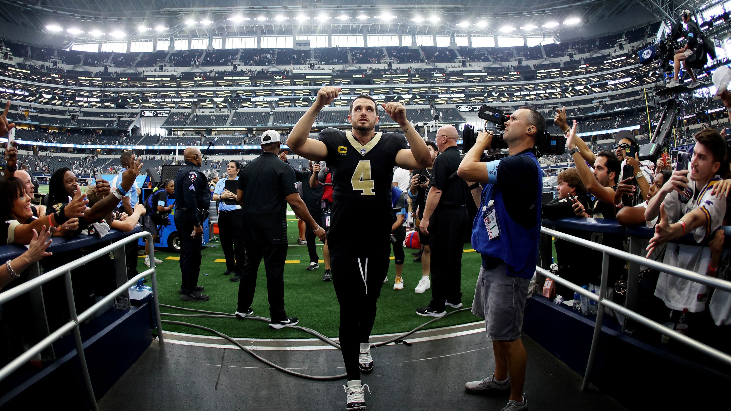 Derek Carr #4 of the New Orleans Saints walks off the field after the game against the Dallas Cowboys at AT&amp;T Stadium on September 15, 2024 in Arlington, Texas.