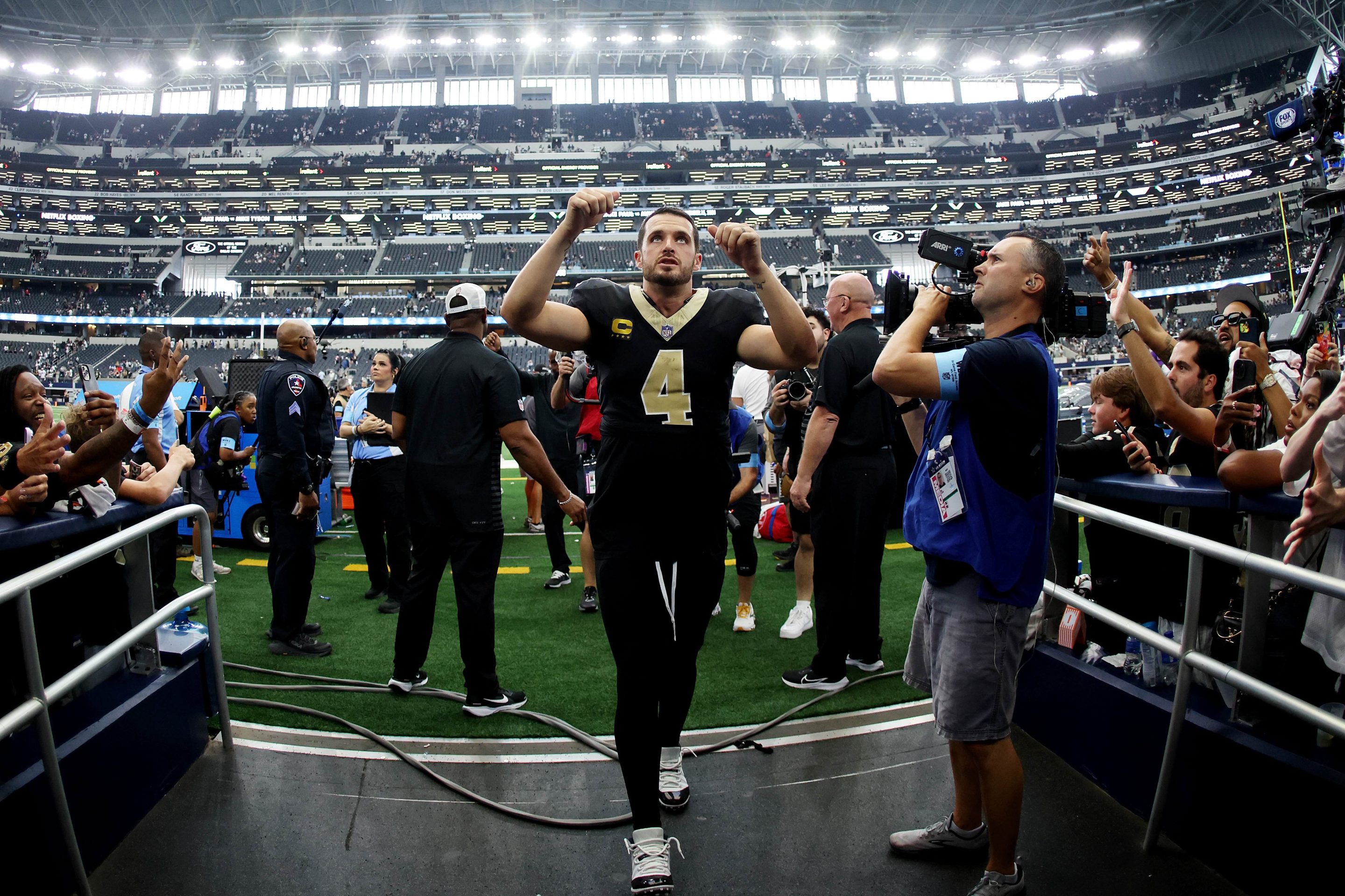 Derek Carr #4 of the New Orleans Saints walks off the field after the game against the Dallas Cowboys at AT&amp;T Stadium on September 15, 2024 in Arlington, Texas.