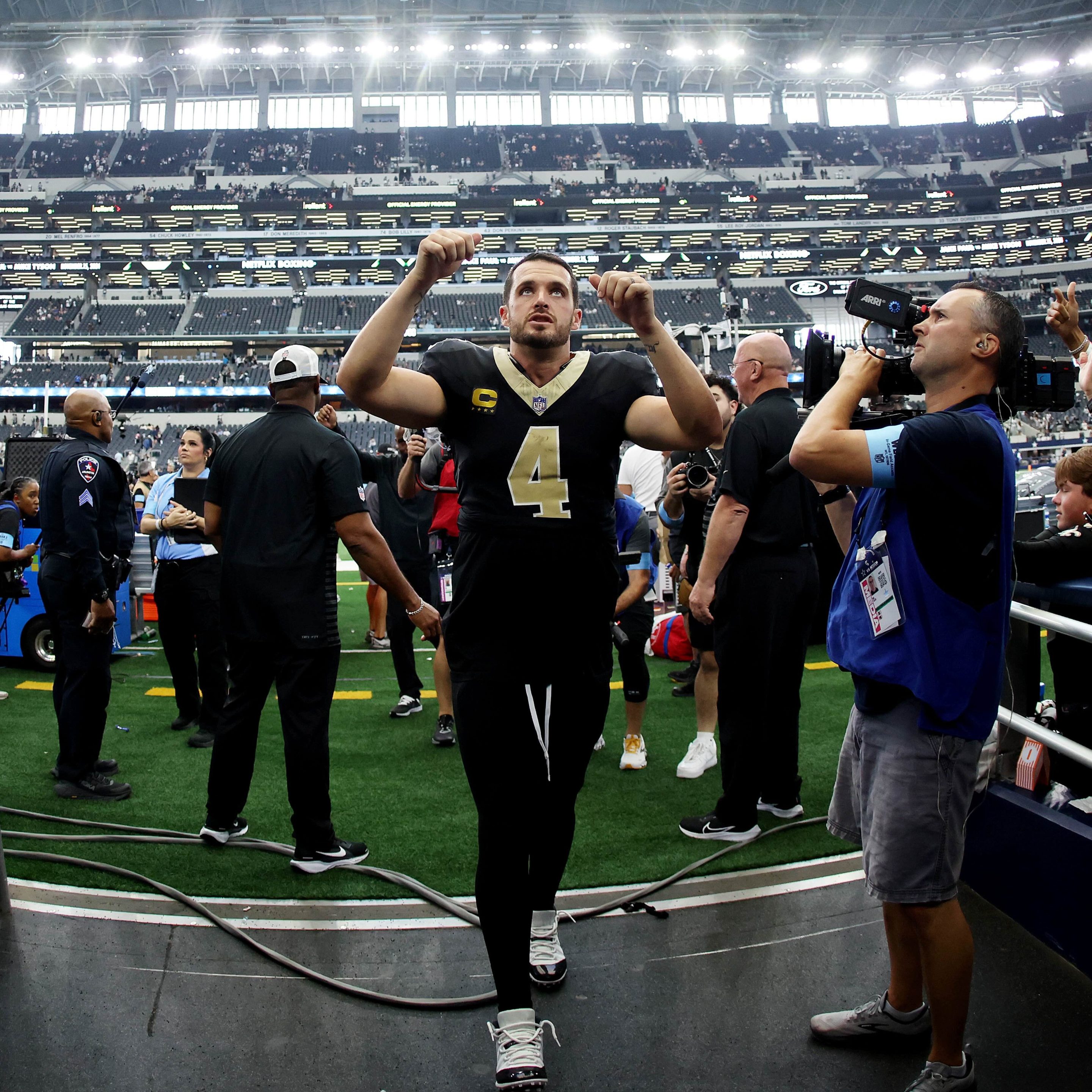 Derek Carr #4 of the New Orleans Saints walks off the field after the game against the Dallas Cowboys at AT&amp;T Stadium on September 15, 2024 in Arlington, Texas.