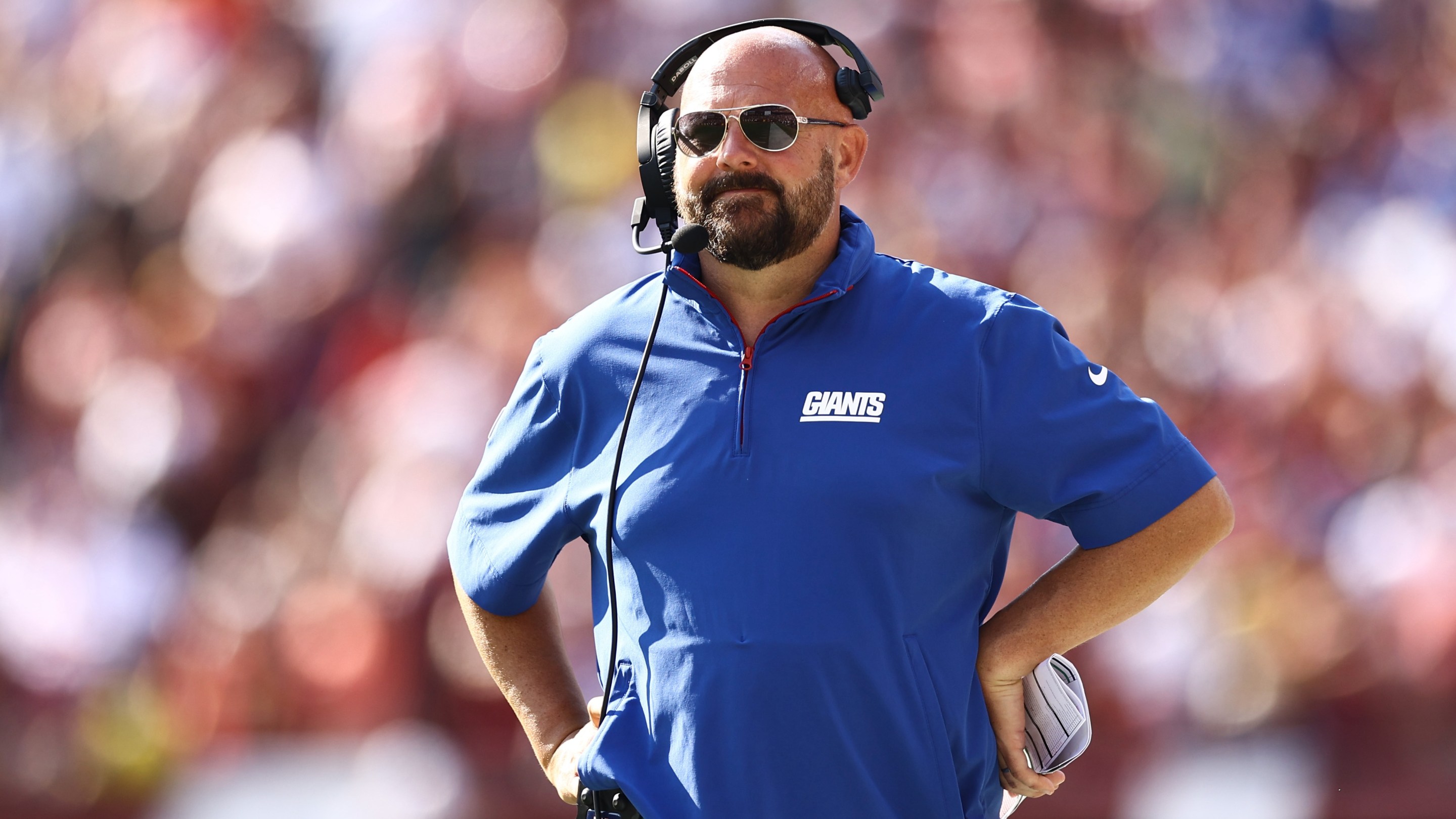 LANDOVER, MARYLAND - SEPTEMBER 15: Head coach Brian Daboll of the New York Giants looks on during the fourth quarter of a game against the Washington Commanders at Northwest Stadium on September 15, 2024 in Landover, Maryland. (Photo by Tim Nwachukwu/Getty Images)