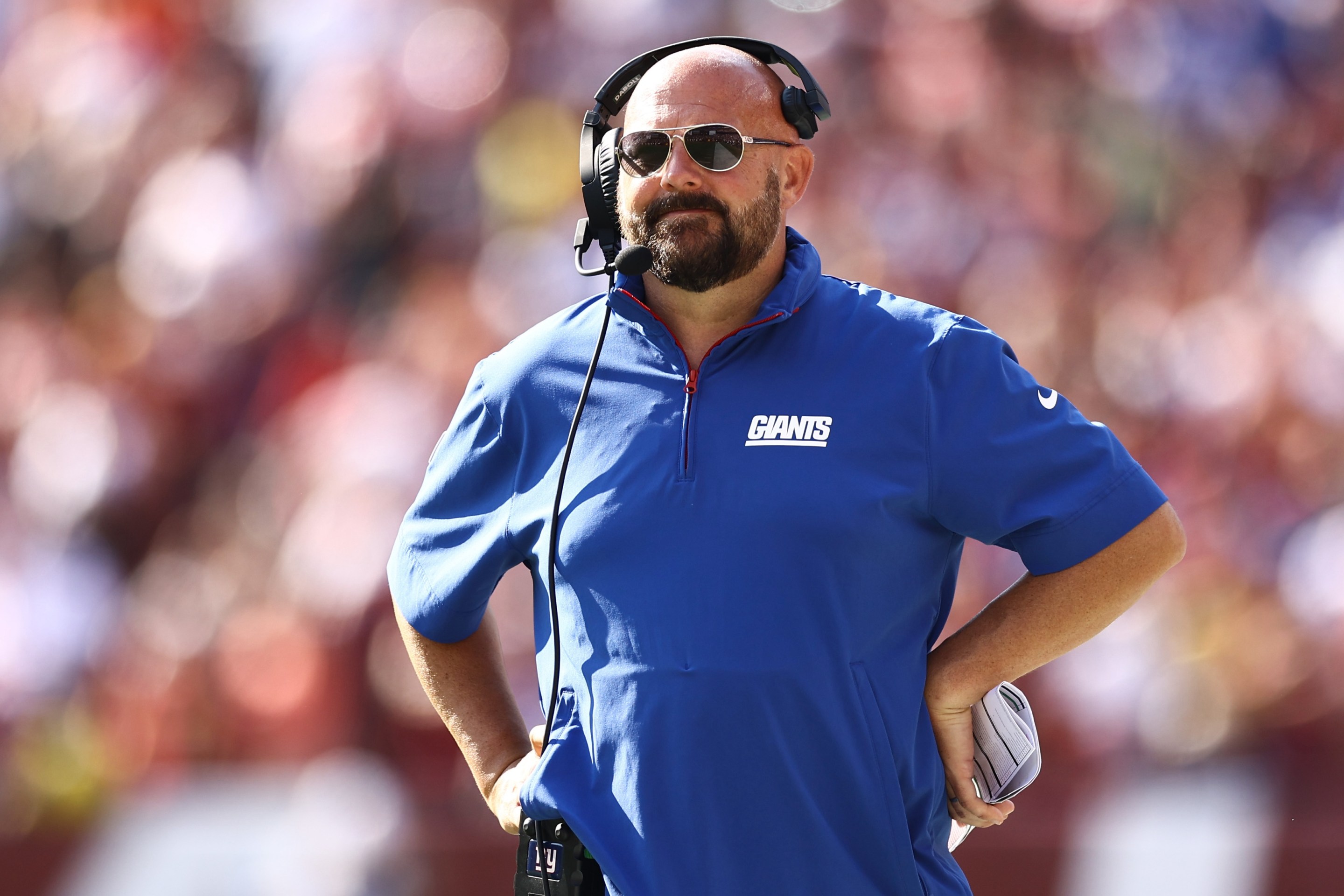 LANDOVER, MARYLAND - SEPTEMBER 15: Head coach Brian Daboll of the New York Giants looks on during the fourth quarter of a game against the Washington Commanders at Northwest Stadium on September 15, 2024 in Landover, Maryland. (Photo by Tim Nwachukwu/Getty Images)