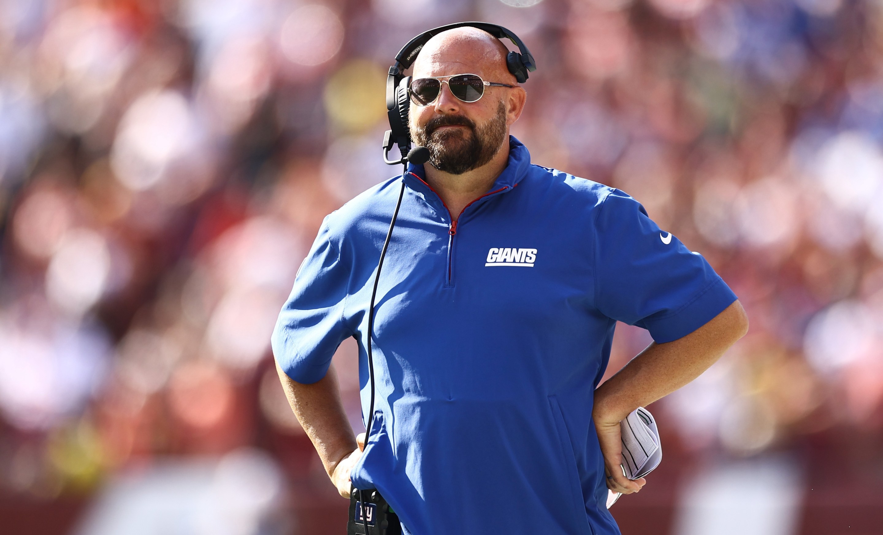 LANDOVER, MARYLAND - SEPTEMBER 15: Head coach Brian Daboll of the New York Giants looks on during the fourth quarter of a game against the Washington Commanders at Northwest Stadium on September 15, 2024 in Landover, Maryland. (Photo by Tim Nwachukwu/Getty Images)