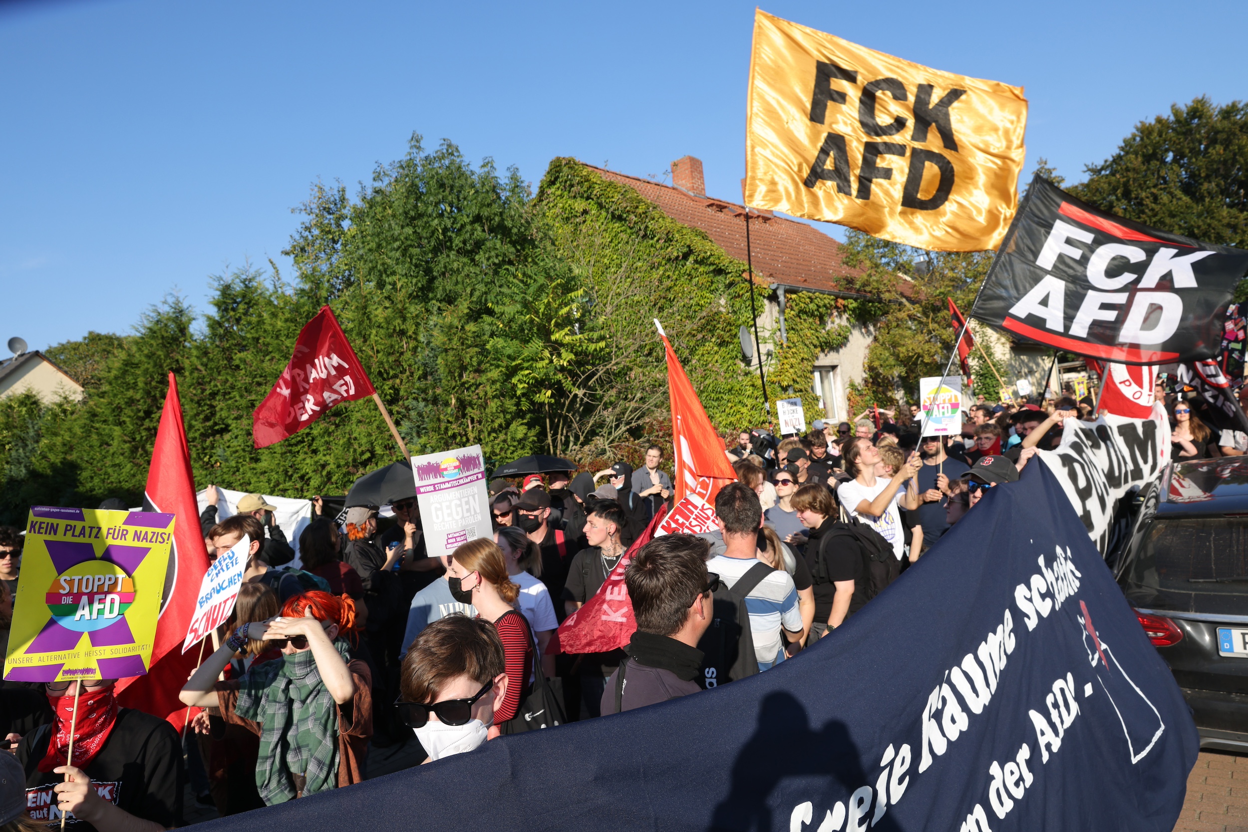 POTSDAM, GERMANY - SEPTEMBER 22: Protesters gather outside the venue where members of the far-right Alternative for Germany (AfD) were holding their election evening party in Brandenburg state elections on September 22, 2024 near Potsdam, Germany. The AfD entered the election today in a neck-and-neck race against the incumbent German Social Democrats (SPD).(Photo by Michele Tantussi/Getty Images)