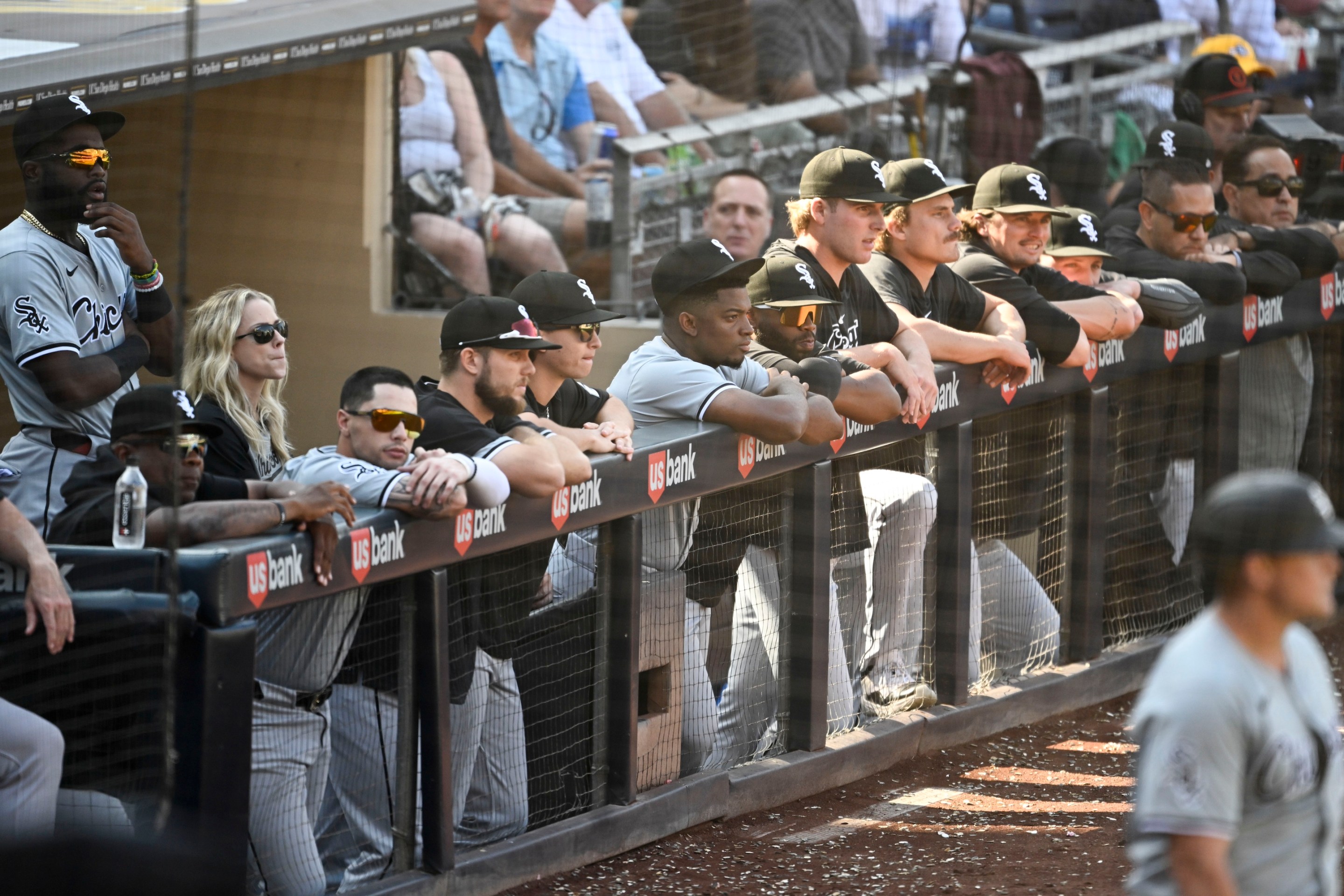 SAN DIEGO, CA - Chicago White Sox playes look out from the dugout during the ninth inning against the San Diego Padres, September 22, 2024 at Petco Park in San Diego, California. (Photo by Denis Poroy/Getty Images)