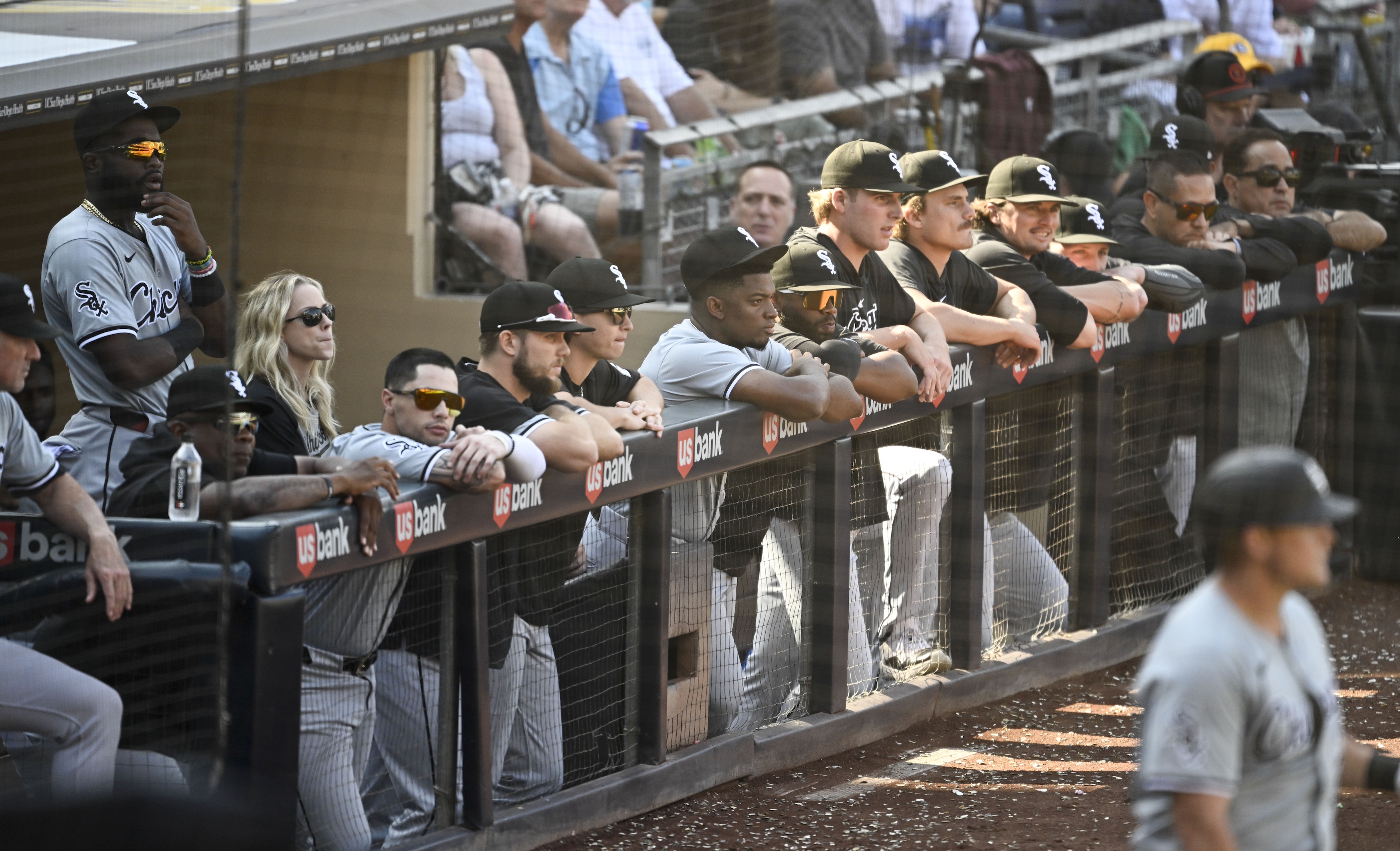 SAN DIEGO, CA - Chicago White Sox playes look out from the dugout during the ninth inning against the San Diego Padres, September 22, 2024 at Petco Park in San Diego, California. (Photo by Denis Poroy/Getty Images)