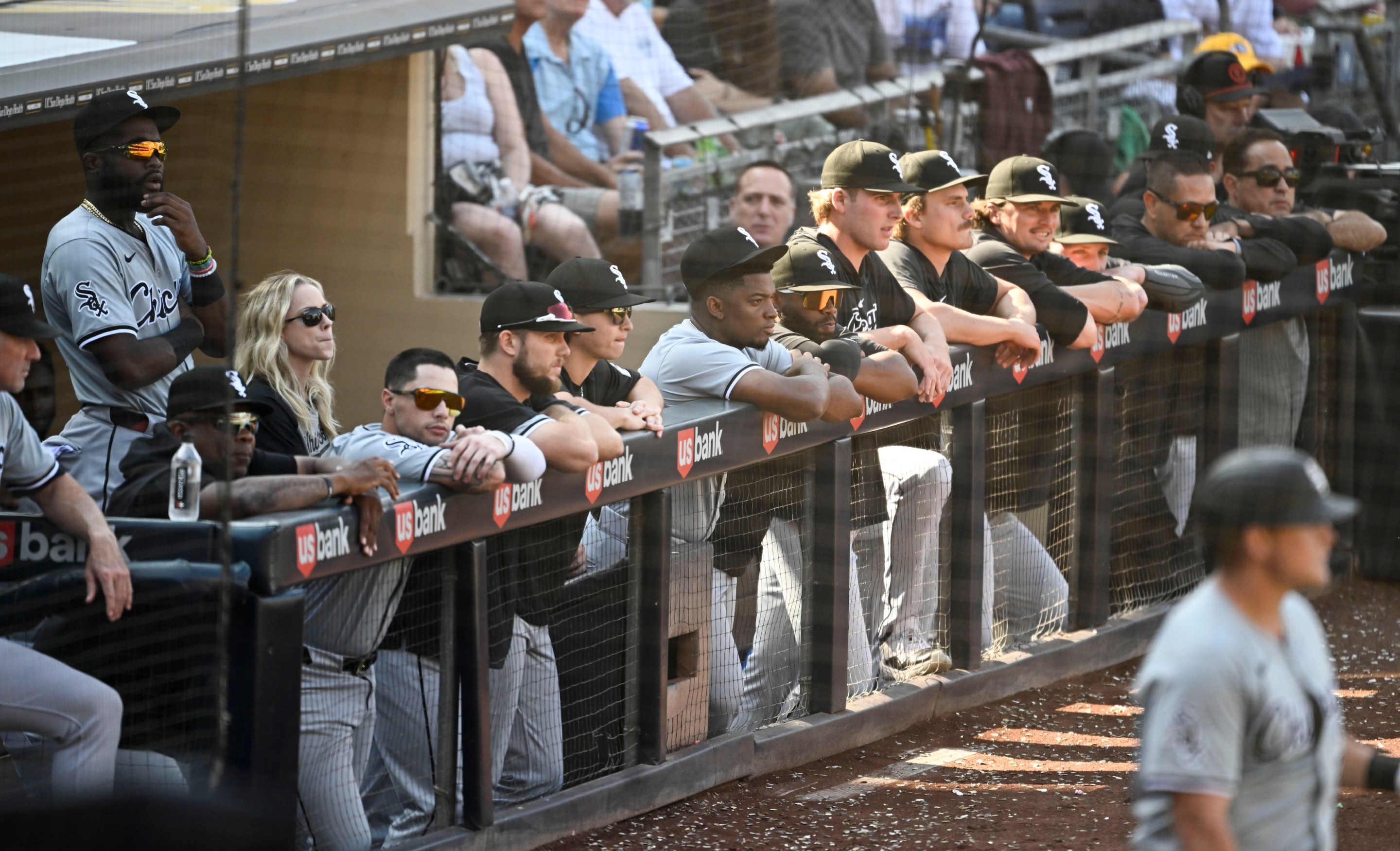 SAN DIEGO, CA - Chicago White Sox playes look out from the dugout during the ninth inning against the San Diego Padres, September 22, 2024 at Petco Park in San Diego, California. (Photo by Denis Poroy/Getty Images)