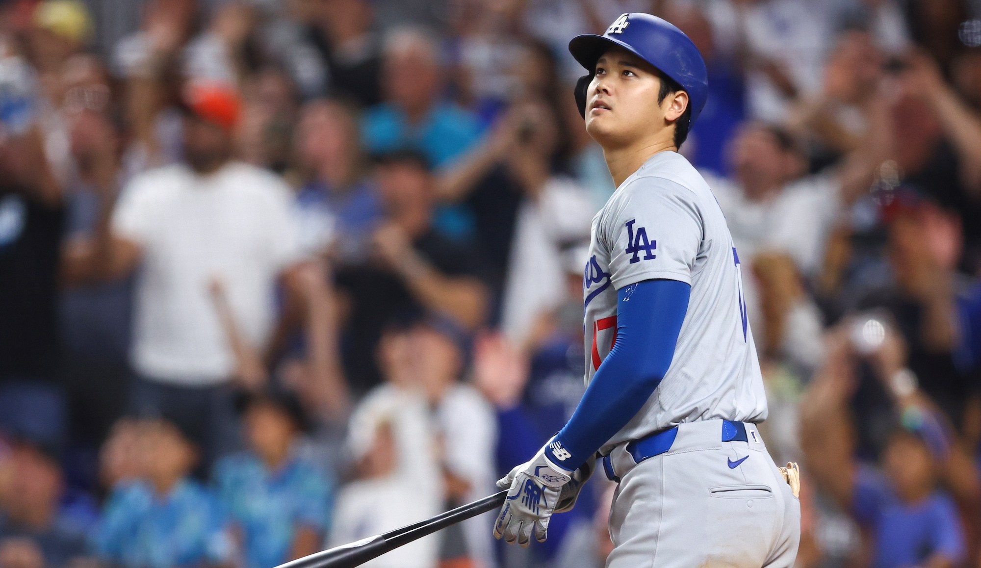 MIAMI, FLORIDA - SEPTEMBER 19: Shohei Ohtani #17 of the Los Angeles Dodgers hits a two-run home run, his 50th of the season, during the seventh inning against the Miami Marlins at loanDepot park on September 19, 2024 in Miami, Florida. Ohtani is now the first MLB player to have at least 50 home runs and 50 stolen bases in the same season. (Photo by Megan Briggs/Getty Images)