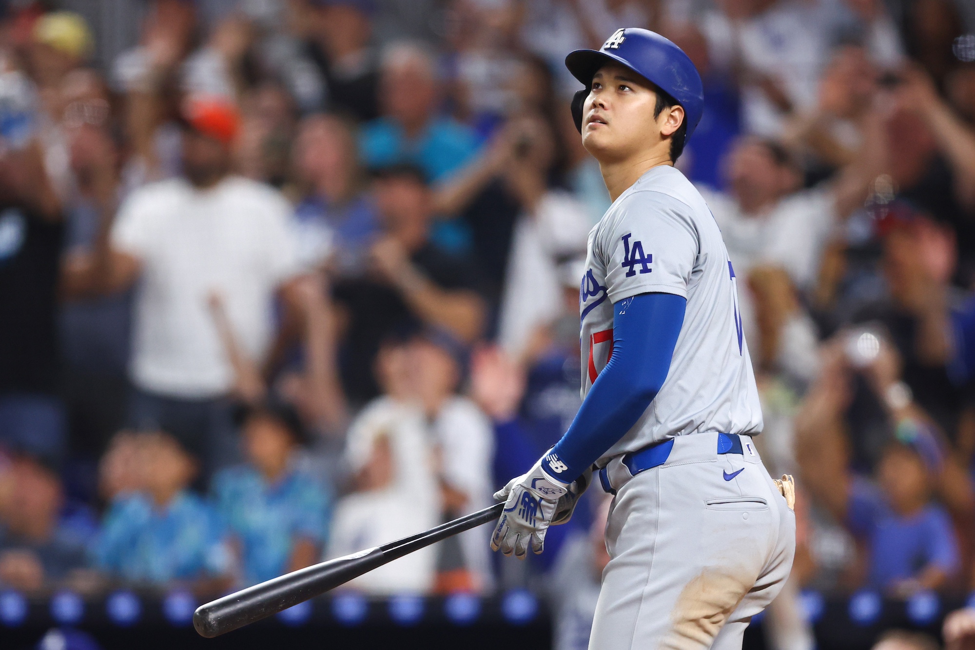 MIAMI, FLORIDA - SEPTEMBER 19: Shohei Ohtani #17 of the Los Angeles Dodgers hits a two-run home run, his 50th of the season, during the seventh inning against the Miami Marlins at loanDepot park on September 19, 2024 in Miami, Florida. Ohtani is now the first MLB player to have at least 50 home runs and 50 stolen bases in the same season. (Photo by Megan Briggs/Getty Images)