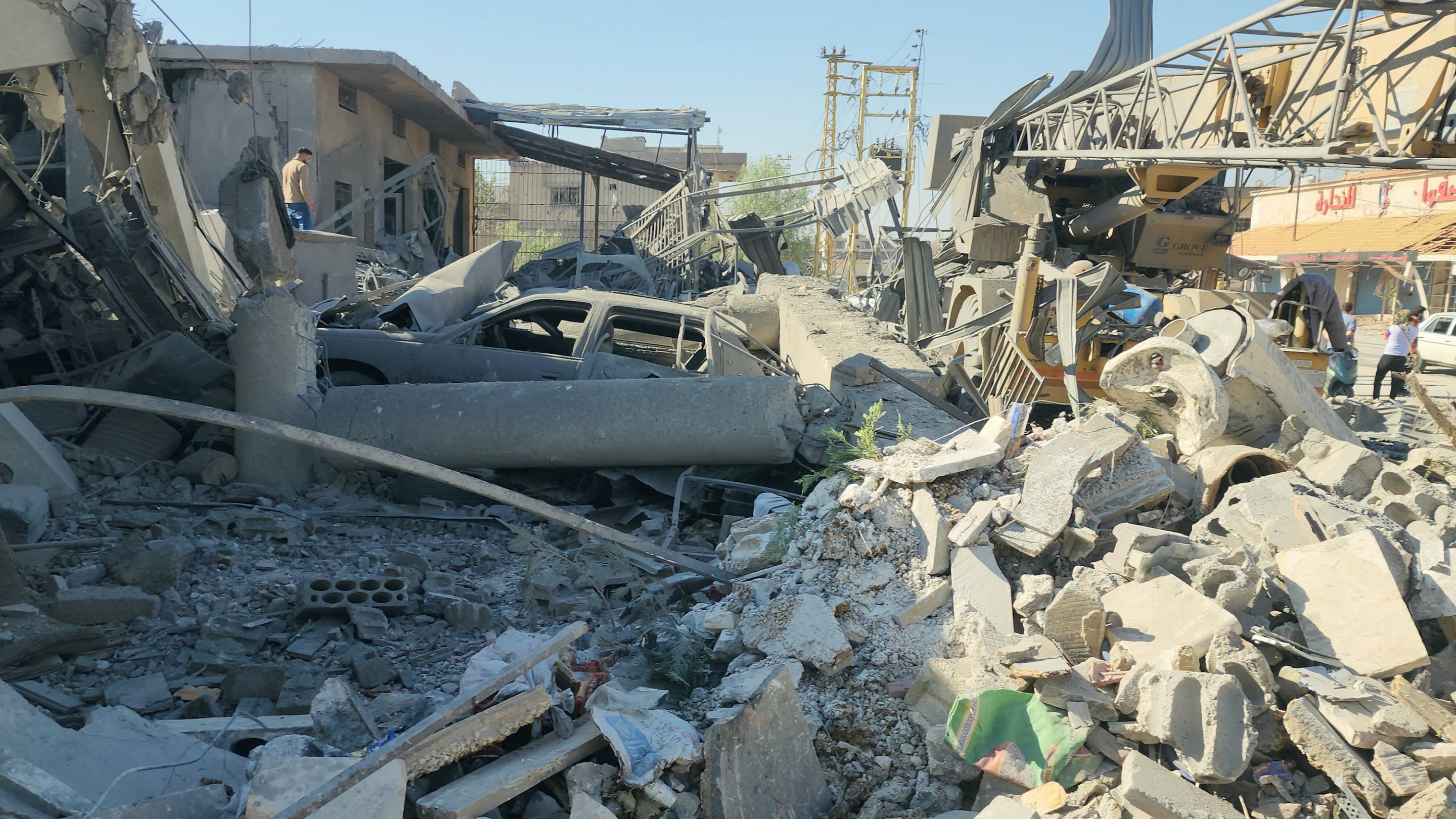 A picture taken on September 24, 2024, shows the debris and destruction at the site of an overnight Israeli strike on a neighbourhood in the Lebanese city of Baalbeck