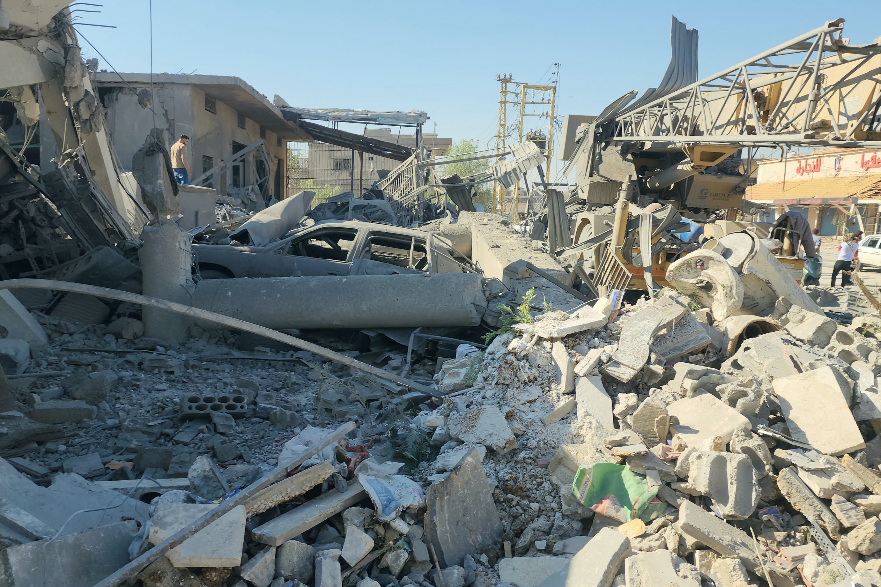 A picture taken on September 24, 2024, shows the debris and destruction at the site of an overnight Israeli strike on a neighbourhood in the Lebanese city of Baalbeck