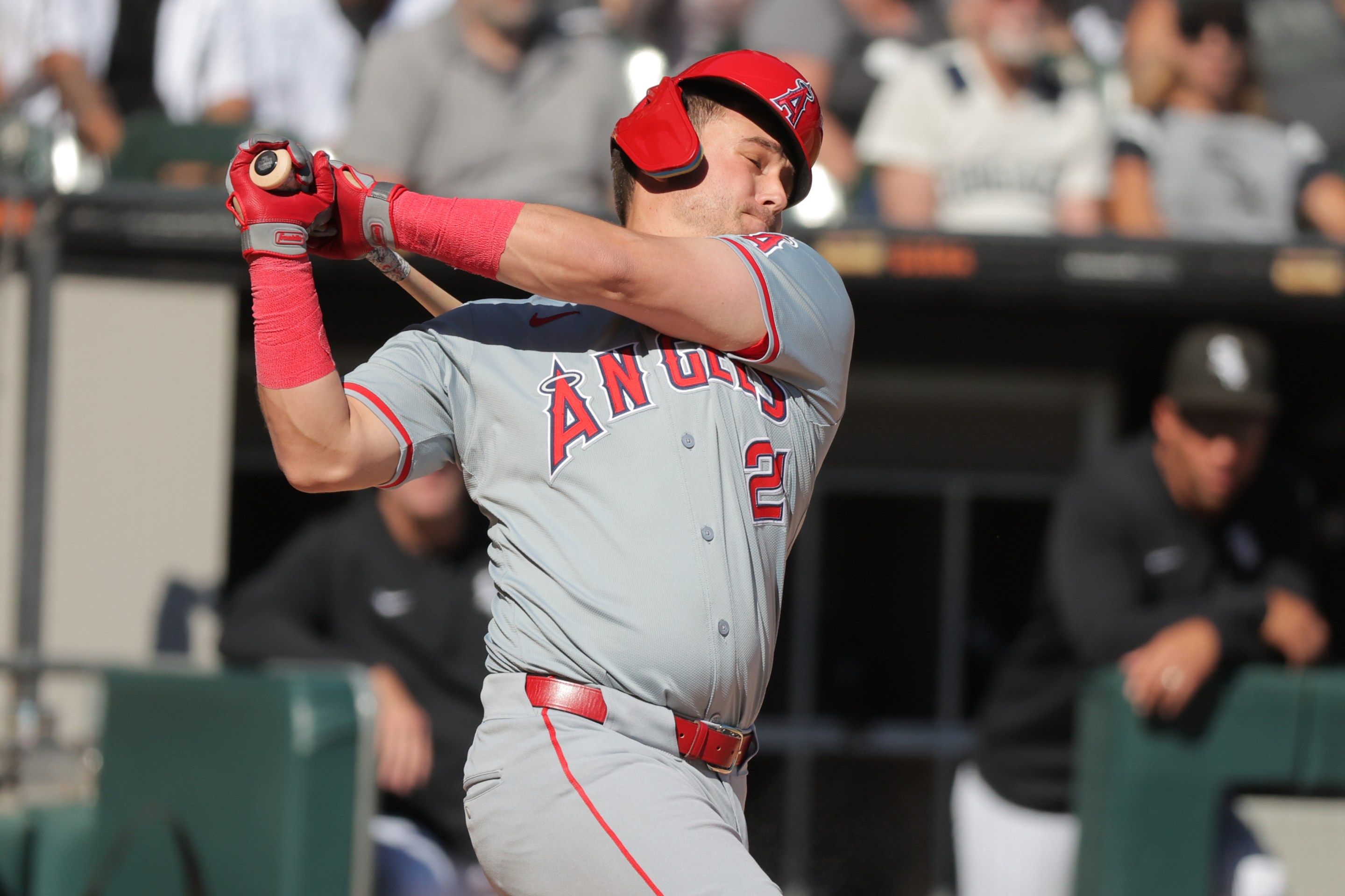 Matt Thaiss of the Los Angeles Angels strikes out swinging during the fifth inning against the Chicago White Sox on September 26,2024. His helmet's all wonky on his head.