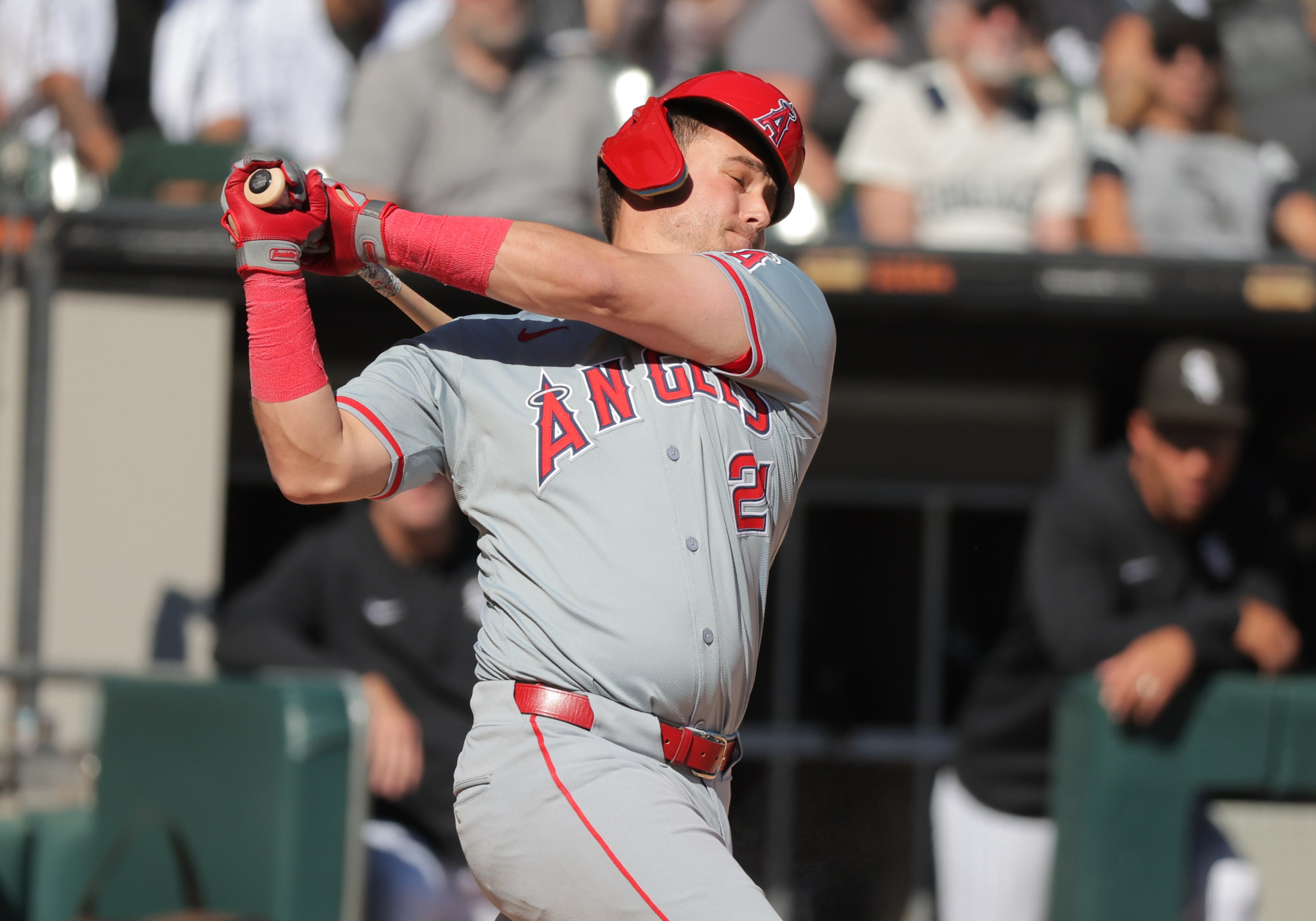 Matt Thaiss of the Los Angeles Angels strikes out swinging during the fifth inning against the Chicago White Sox on September 26,2024. His helmet's all wonky on his head.