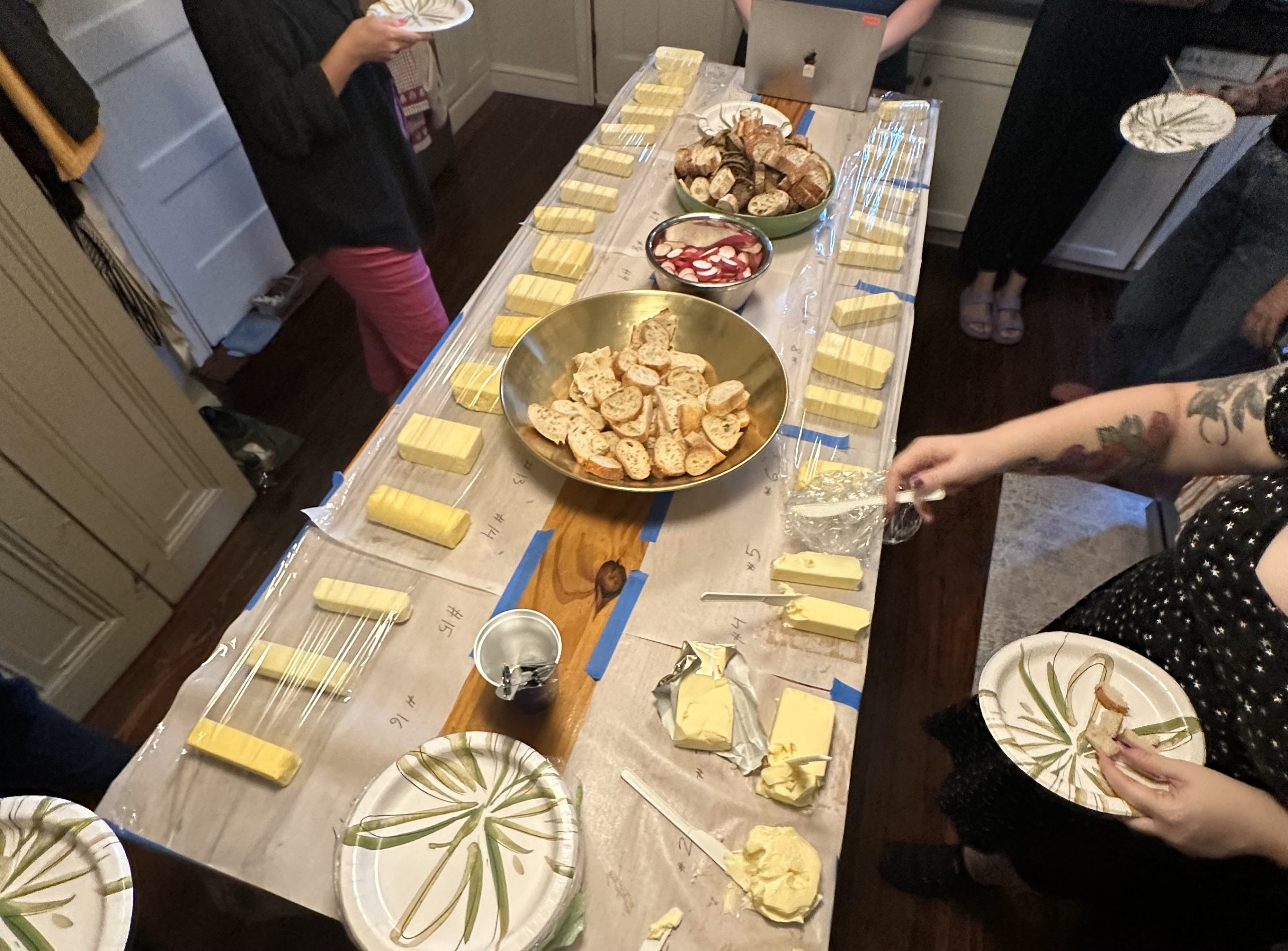 lots of butter out on a table, available for spreading