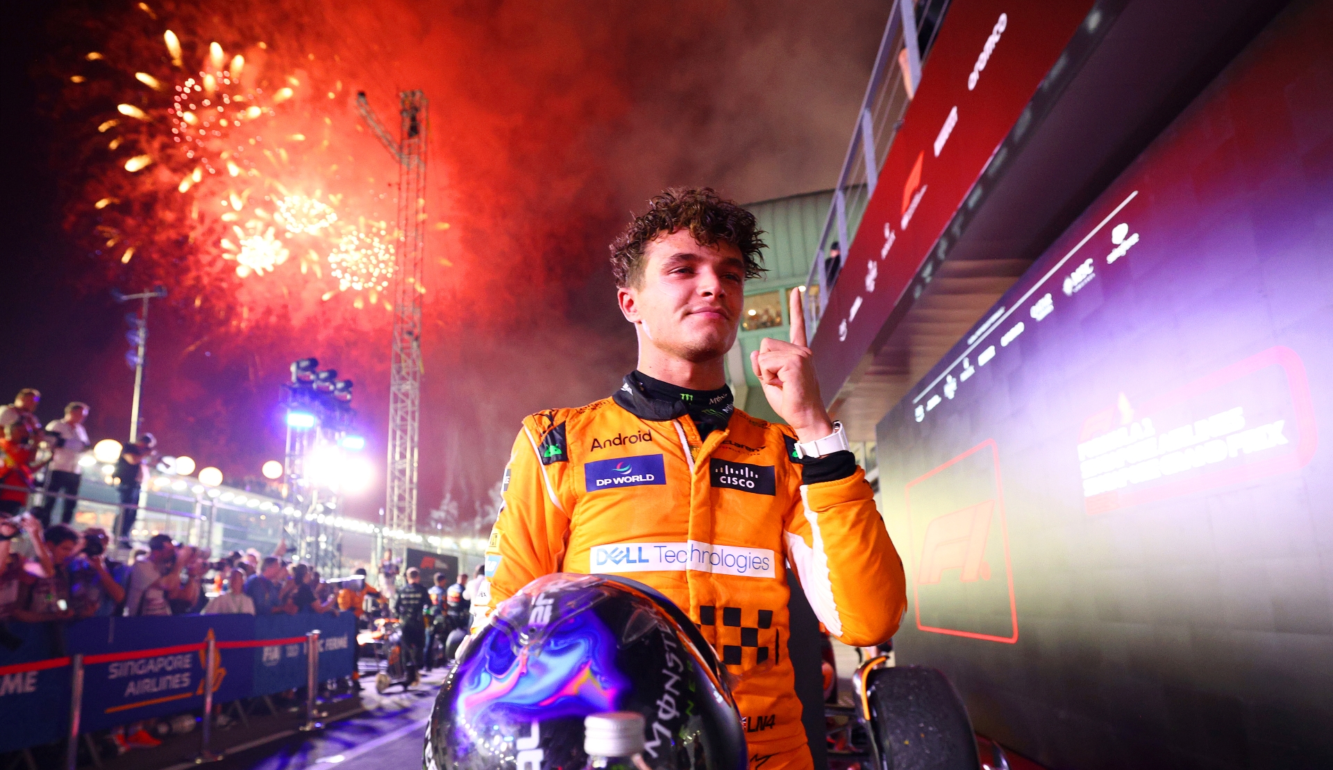 Race winner Lando Norris of Great Britain and McLaren celebrates in parc ferme during the F1 Grand Prix of Singapore.