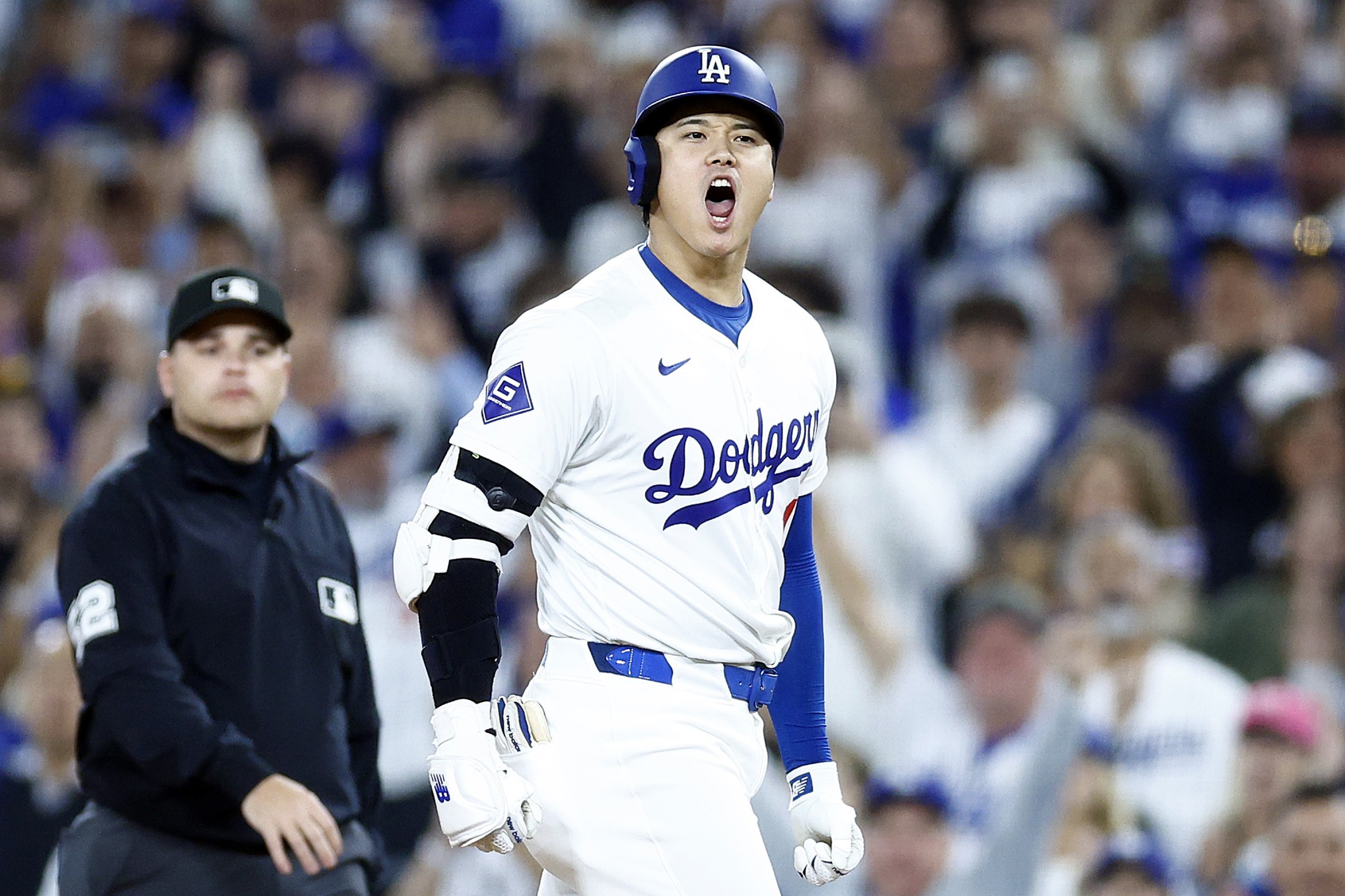 Shohei Ohtani #17 of the Los Angeles Dodgers after hitting a single against the San Diego Padres in the sixth inning at Dodger Stadium.