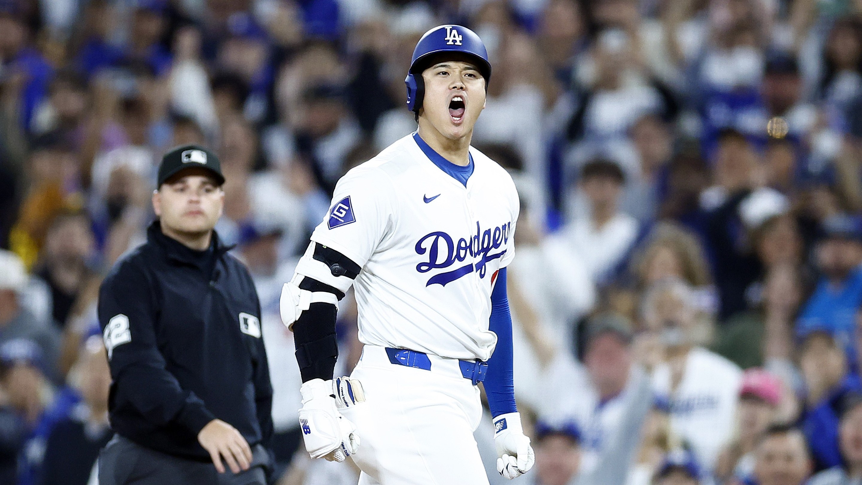 Shohei Ohtani #17 of the Los Angeles Dodgers after hitting a single against the San Diego Padres in the sixth inning at Dodger Stadium.