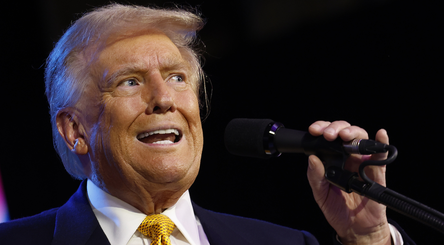 Donald Trump makes a loony-eyed face while speaking at IAC.