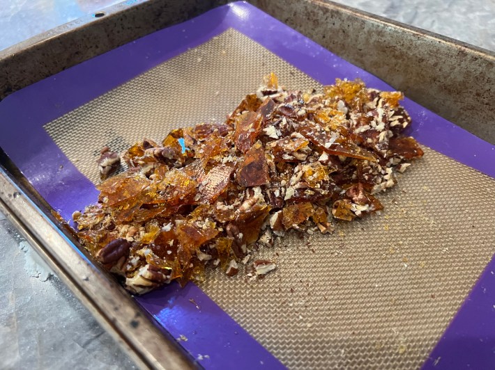 Hardened praline, crumbled into a pile of shards.