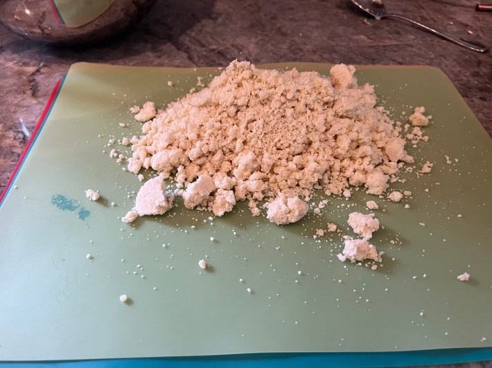 A pile of crumbled dough, not yet formed.