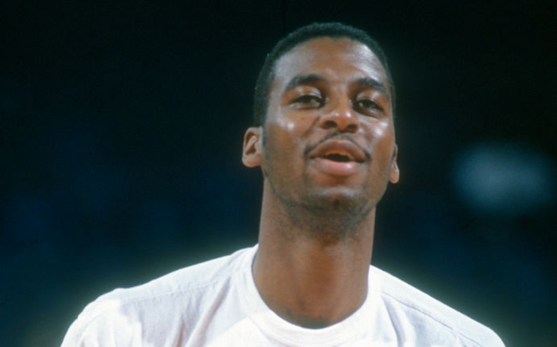 LANDOVER, MD - CIRCA 1992: Jerrod Mustaf #0 of the Phoenix Suns warms up prior to playing the Washington Bullets in an NBA basketball game circa 1992 at the Capital Centre in Landover, Maryland. Mustaf played for the Suns from 1991-94.