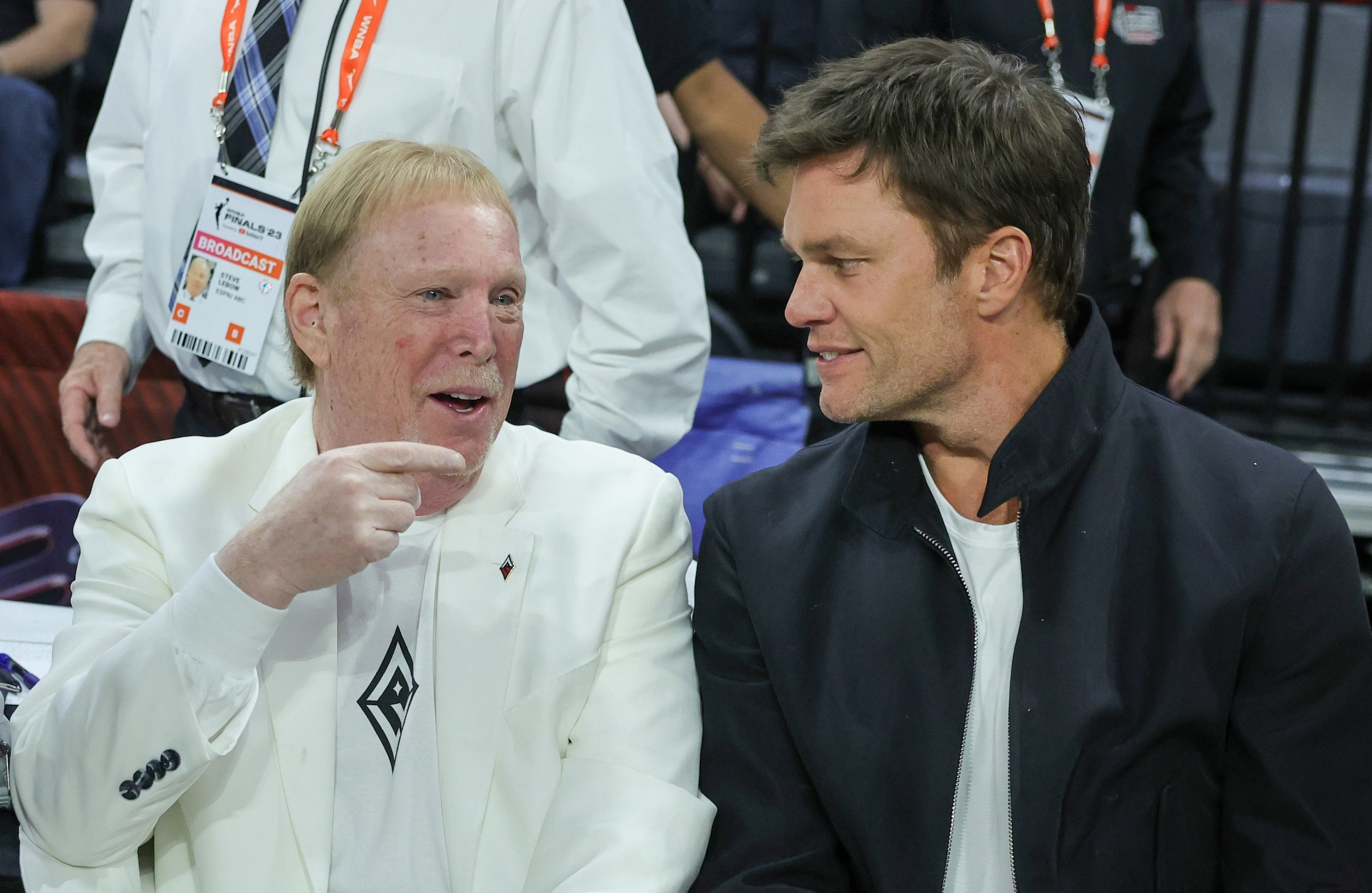 Las Vegas Raiders owner and managing general partner and Las Vegas Aces owner Mark Davis (L) and Tom Brady attend Game One of the 2023 WNBA Playoffs finals between the Aces and the New York Liberty. Brady looks kind of gaunt and pointy; Davis looks like Mark Davis.