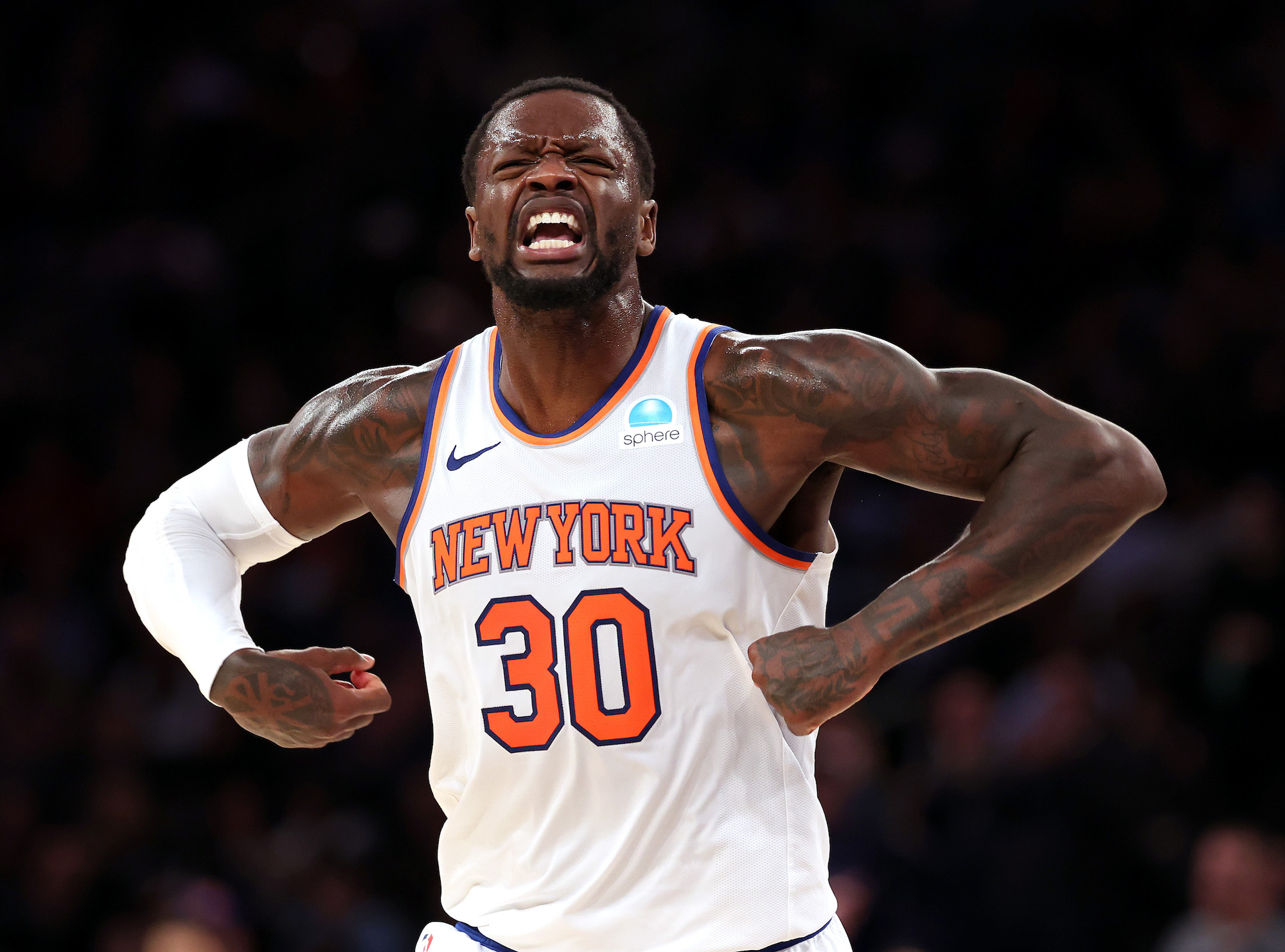 Julius Randle #30 of the New York Knicks celebrates scoring against the Toronto Raptors during their game at Madison Square Garden on December 11, 2023 in New York City. User expressly acknowledges and agrees that, by downloading and or using this photograph, User is consenting to the terms and conditions of the Getty Images License Agreement. (Photo by Al Bello/Getty Images)