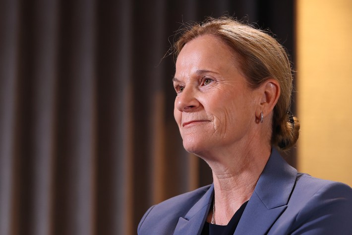 Jill Ellis gives an interview on May 15, 2024 in Bangkok, Thailand. She is seating and wearing a blue suit.