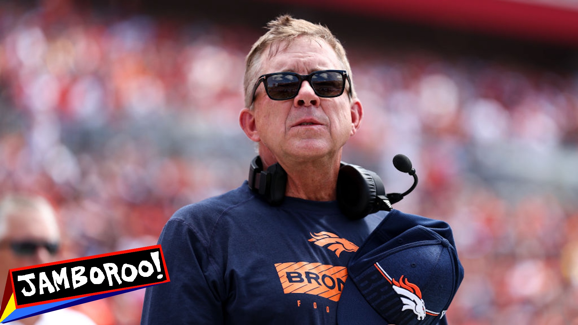 Head coach Sean Payton of the Denver Broncos stands on the sidelines during the national anthem prior to an NFL football game against the Tampa Bay Buccaneers at Raymond James Stadium on September 22, 2024 in Tampa, Florida.