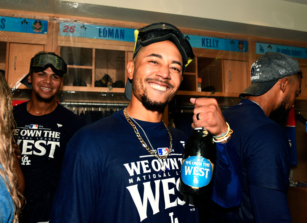 Mookie Betts #50 of the Los Angeles Dodgers celebrates after winning the NL West Division against the San Diego Padres at Dodger Stadium on September 26, 2024 in Los Angeles, California.