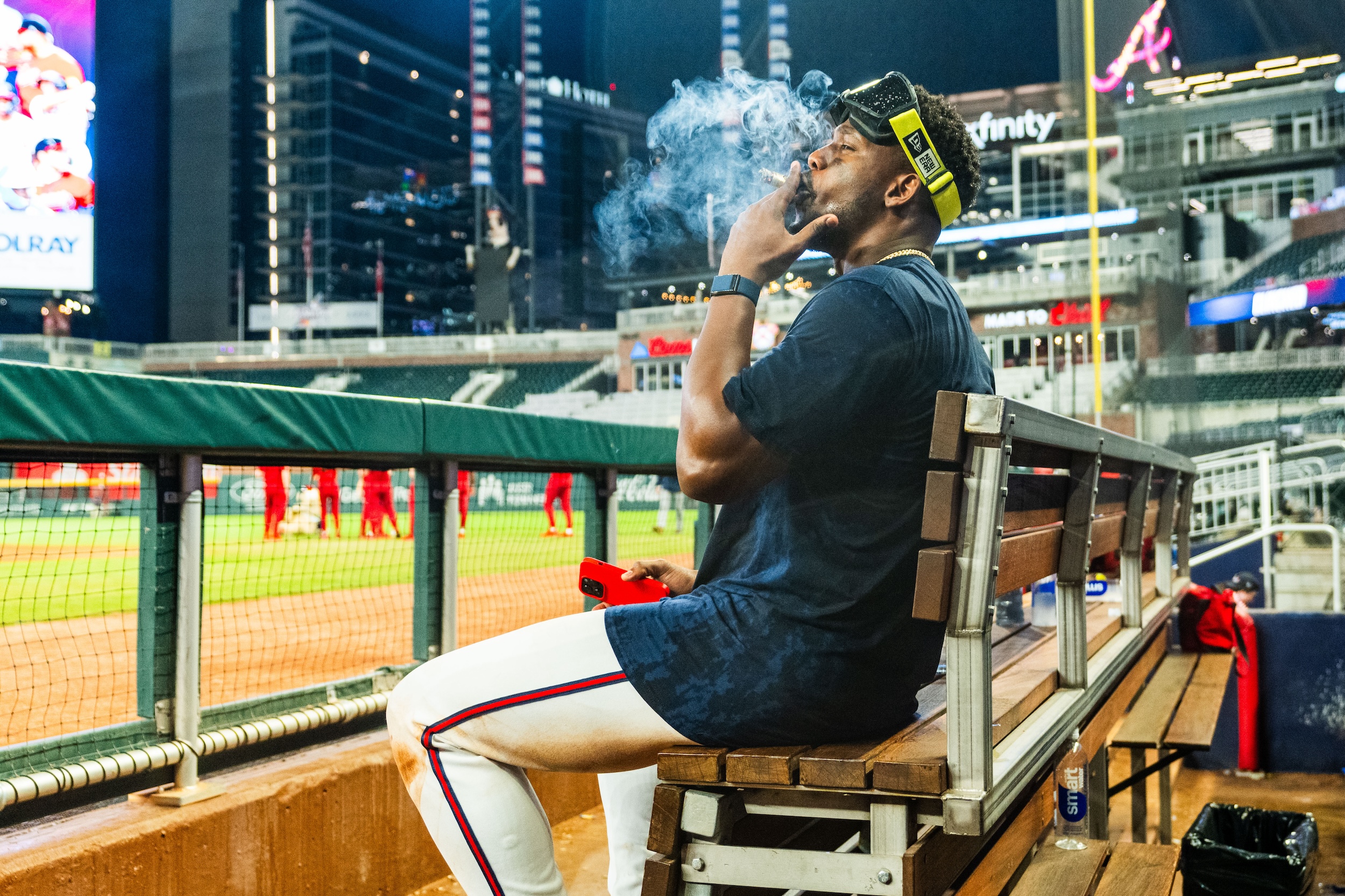 Jorge Soler of the Braves smokes a cigar after his team clinched a playoff berth.