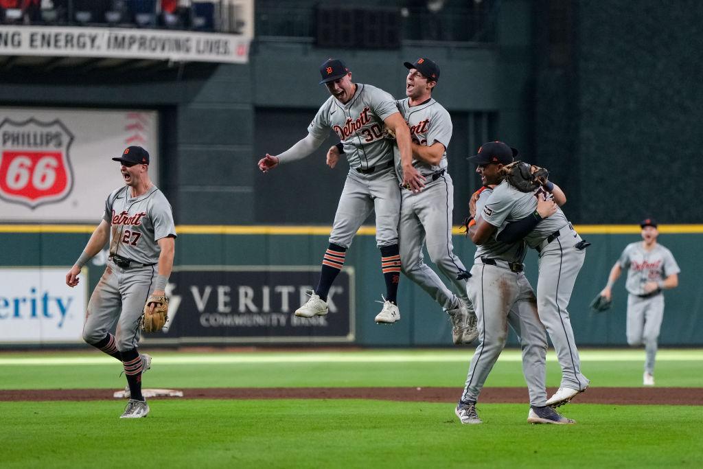 The Detroit Tigers celebrate after beating the Astros