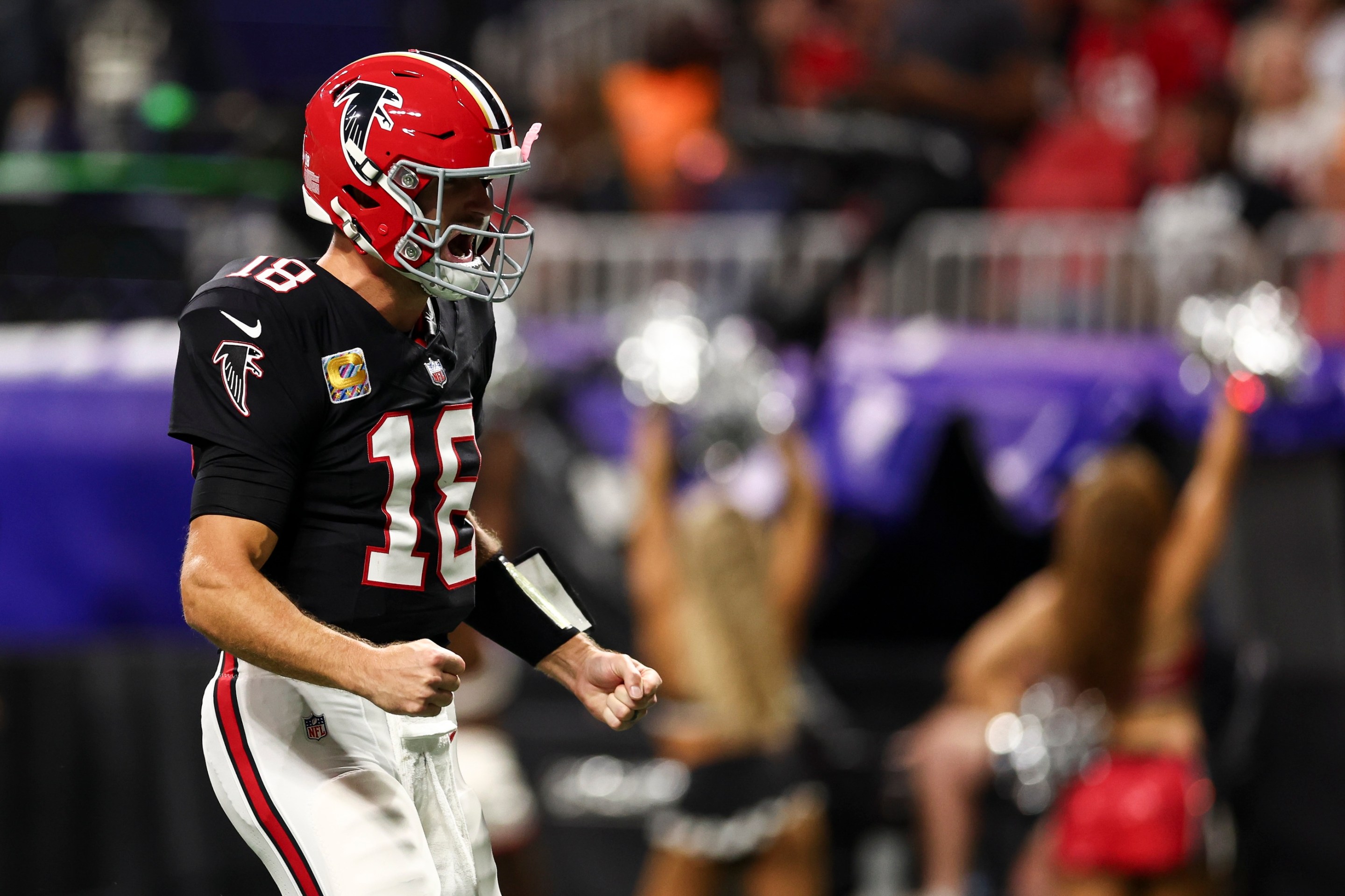 Kirk Cousins ns celebrates after scoring a touchdown during the second quarter of an NFL football game against the Tampa Bay Buccaneers.