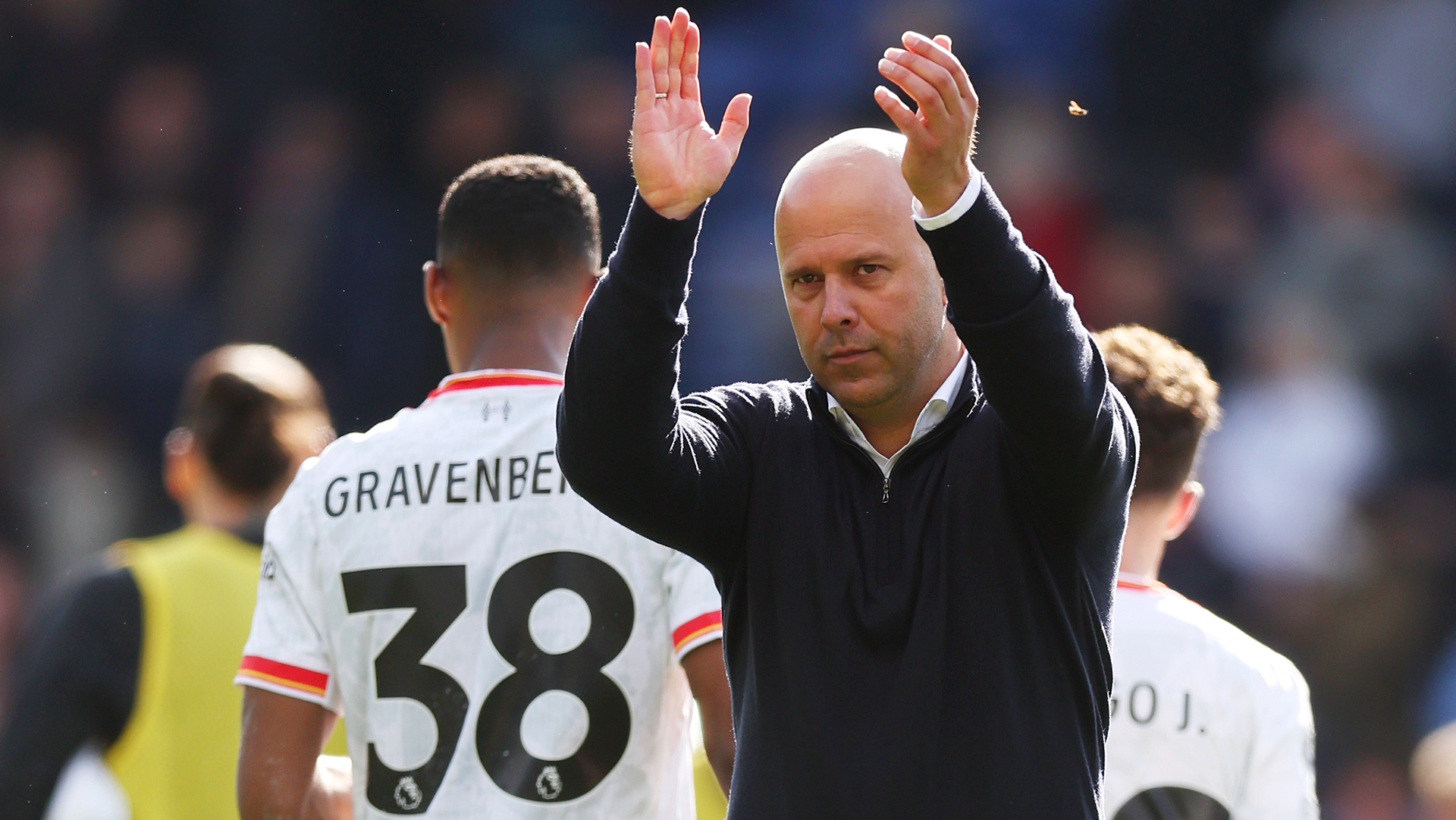 Arne Slot, Manager of Liverpool, applauds the fans following the team's victory during the Premier League match between Crystal Palace FC and Liverpool FC at Selhurst Park on October 05, 2024 in London, England.